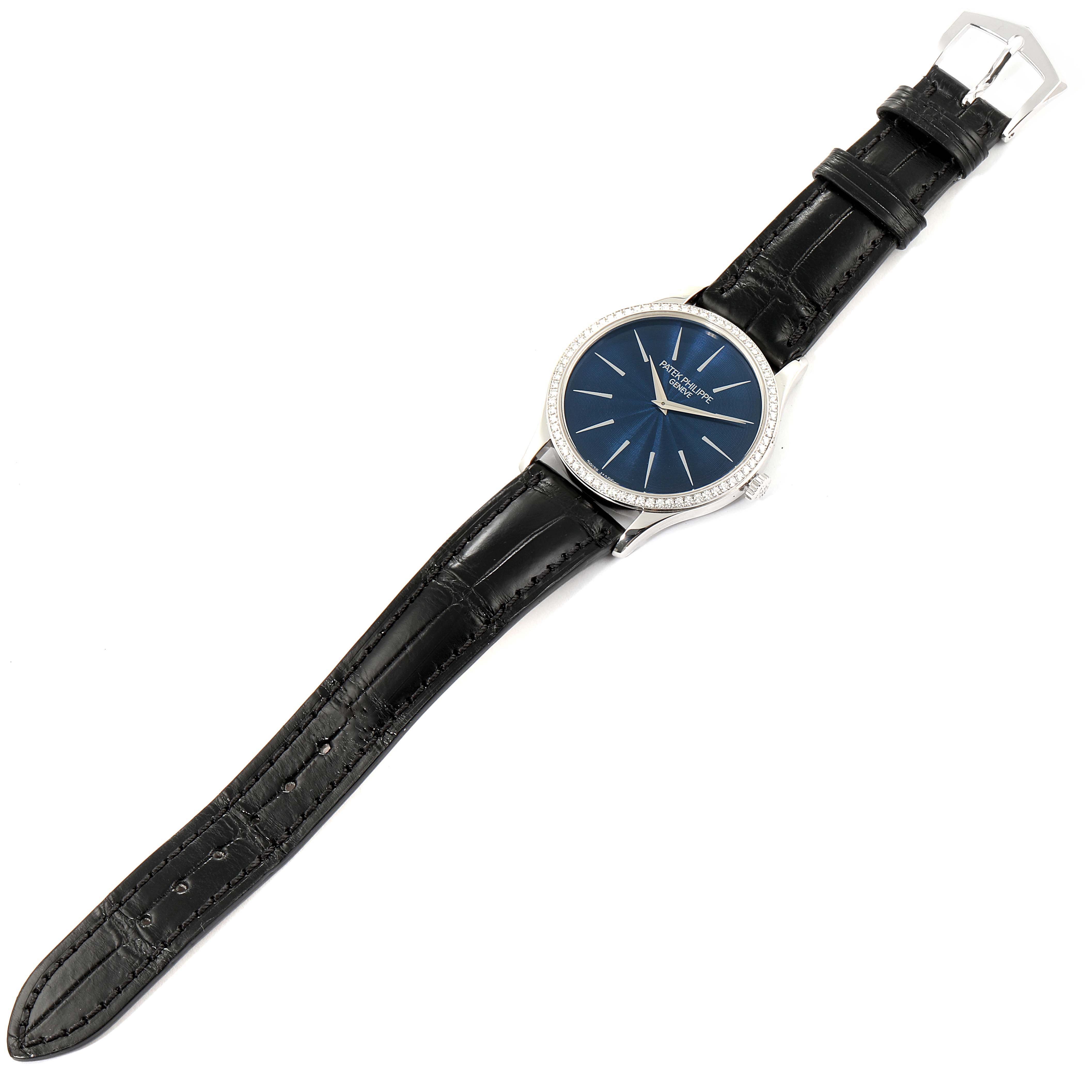 This image shows a Patek Philippe Calatrava 4896G Women's White Gold Blue Dial 4896G Women's White Gold Blue Dial watch angled diagonally, displaying the face, strap, and buckle.