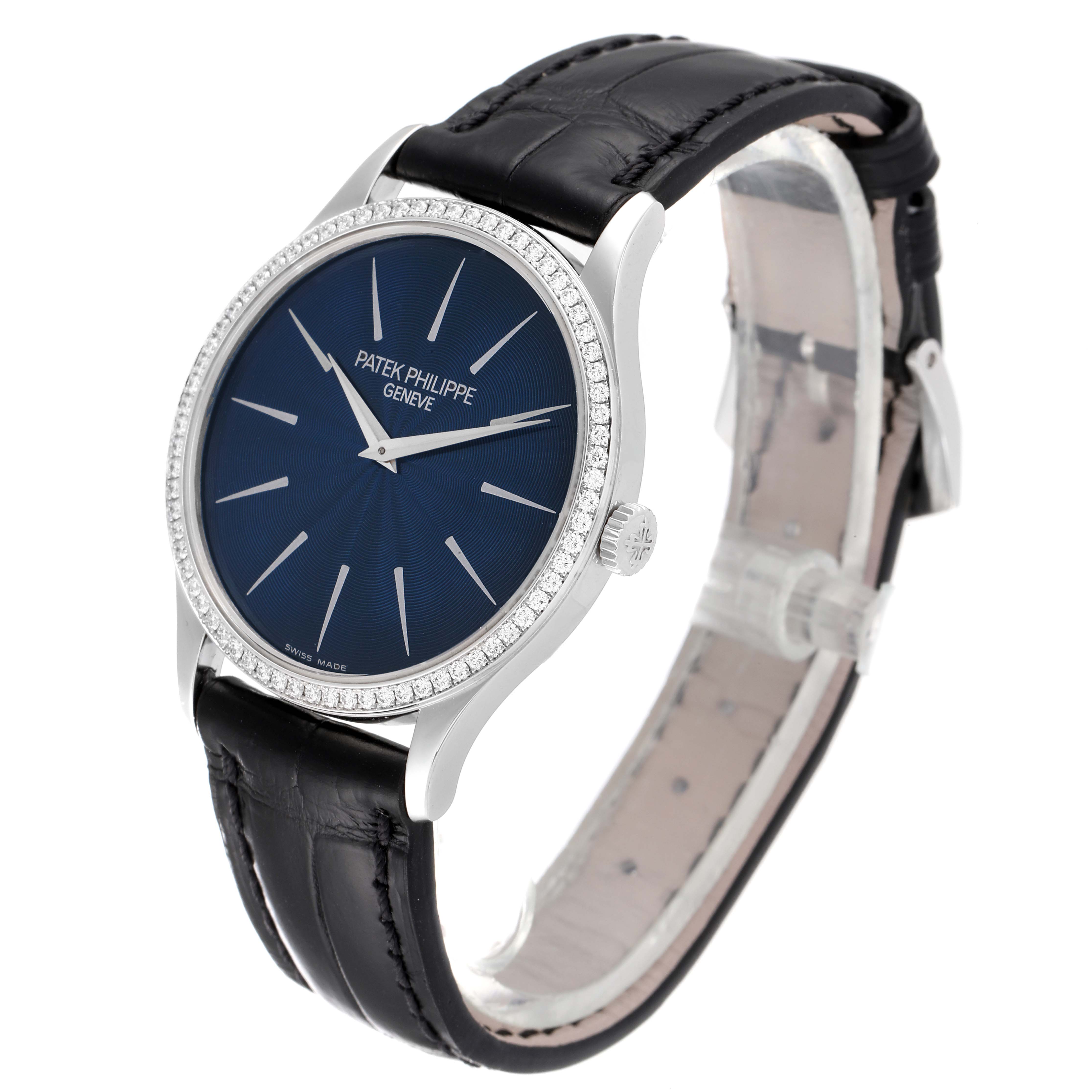 The Patek Philippe Calatrava 4896G Women's White Gold Blue Dial 4896G Women's White Gold Blue Dial watch is shown at a three-quarter angle, highlighting the blue dial, black leather strap, and bejeweled bezel.