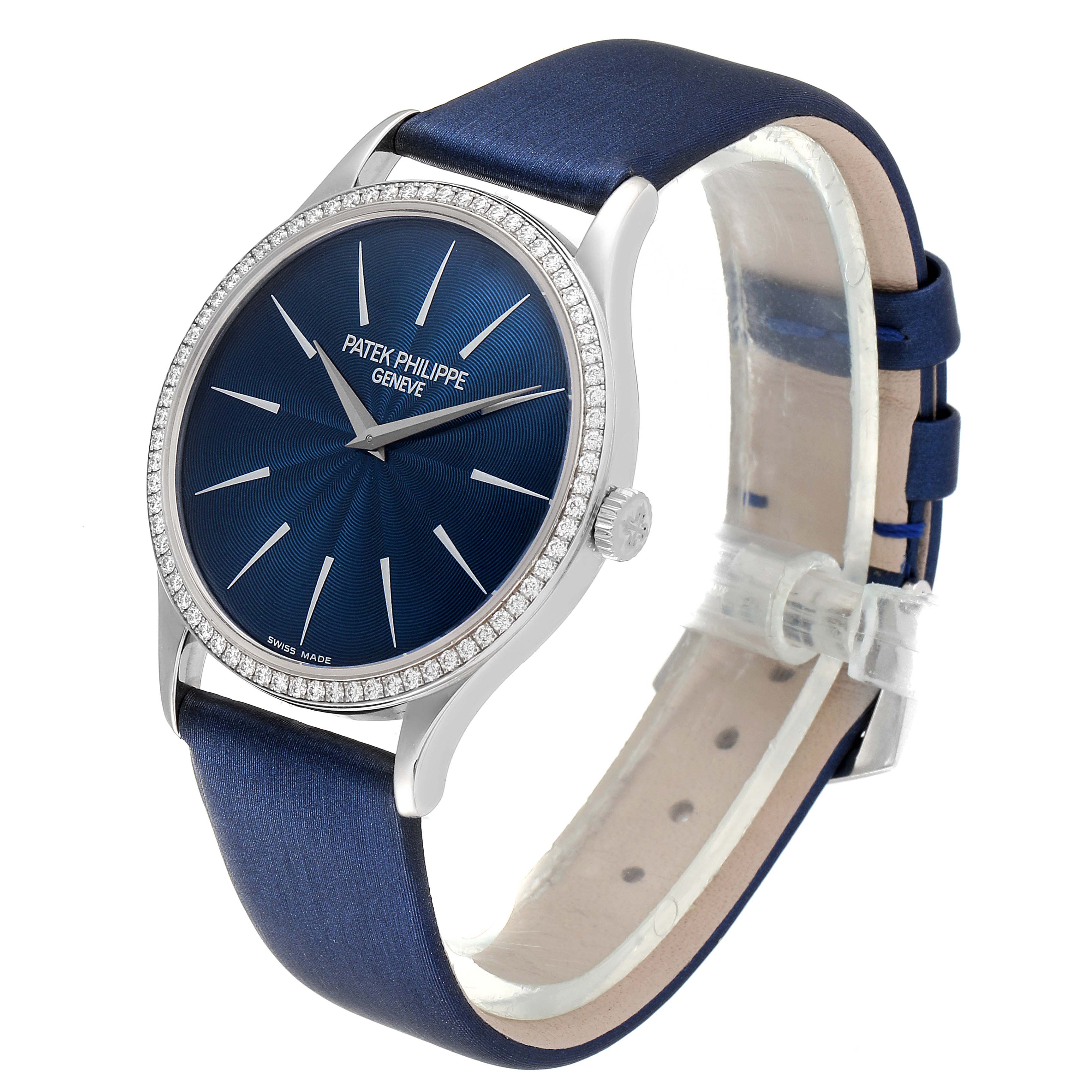 The angled view of the Patek Philippe Calatrava 4896G Men's White Gold Blue Dial 4896G Men's White Gold Blue Dial shows the watch face, bezel, crown, and leather strap.