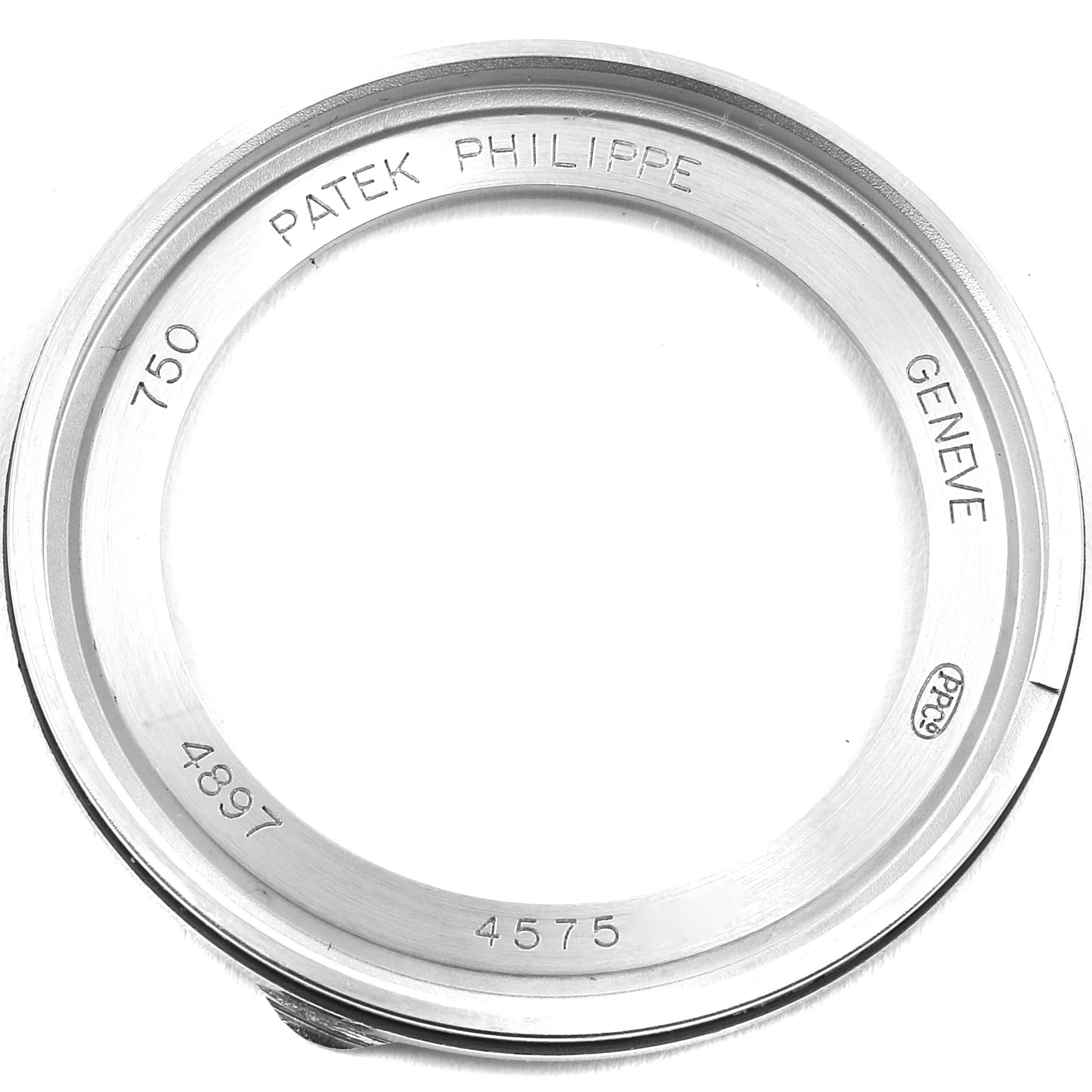 This image shows a close-up view of the bezel for a Patek Philippe Calatrava 4897G-001 Women's White Gold Blue Dial 4897G-001 Women's White Gold Blue Dial model watch.