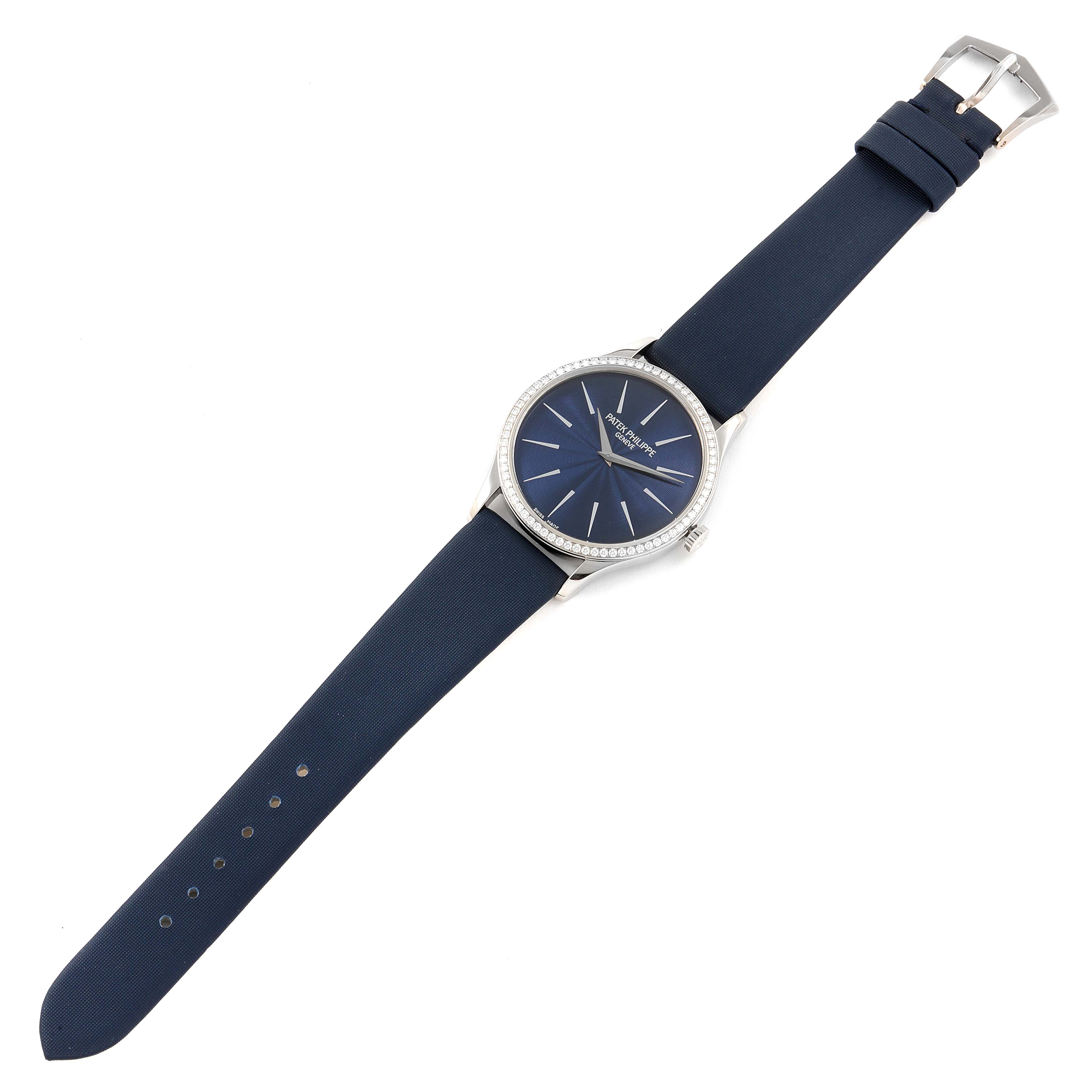 This image shows a top-down view of a Patek Philippe Calatrava 4897G-001 Women's White Gold Blue Dial 4897G-001 Women's White Gold Blue Dial watch, displaying the face, strap, buckle, and case.