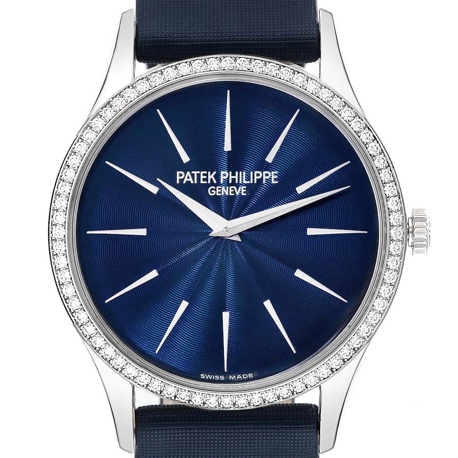 This image shows a front view of the Patek Philippe Calatrava watch with a blue dial and diamond bezel.