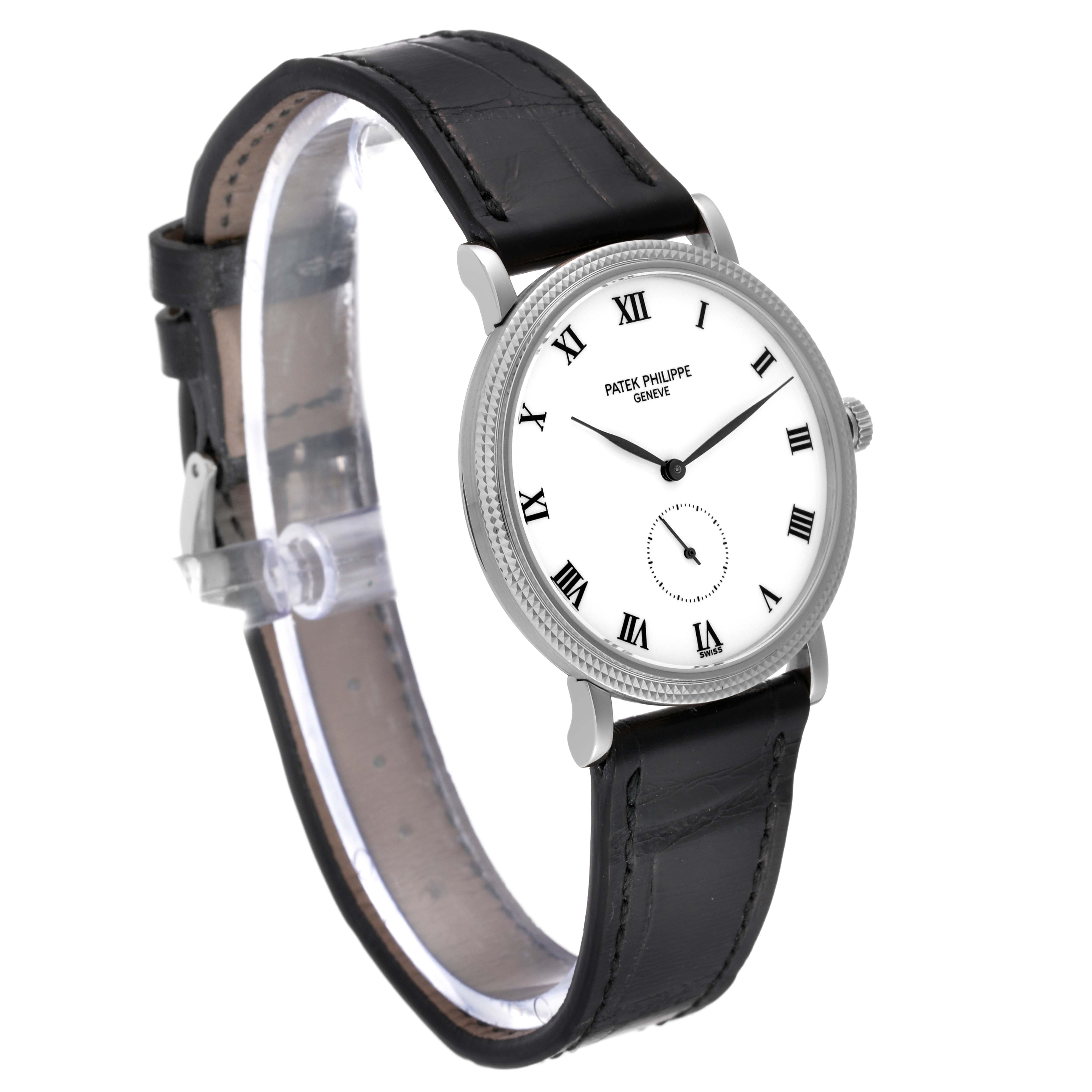 The image shows a Patek Philippe Calatrava 3919G-001 Men
s White Gold White Dial 3919G-001 Men
s White Gold White Dial watch from an angled side view, displaying its face, strap, and crown.