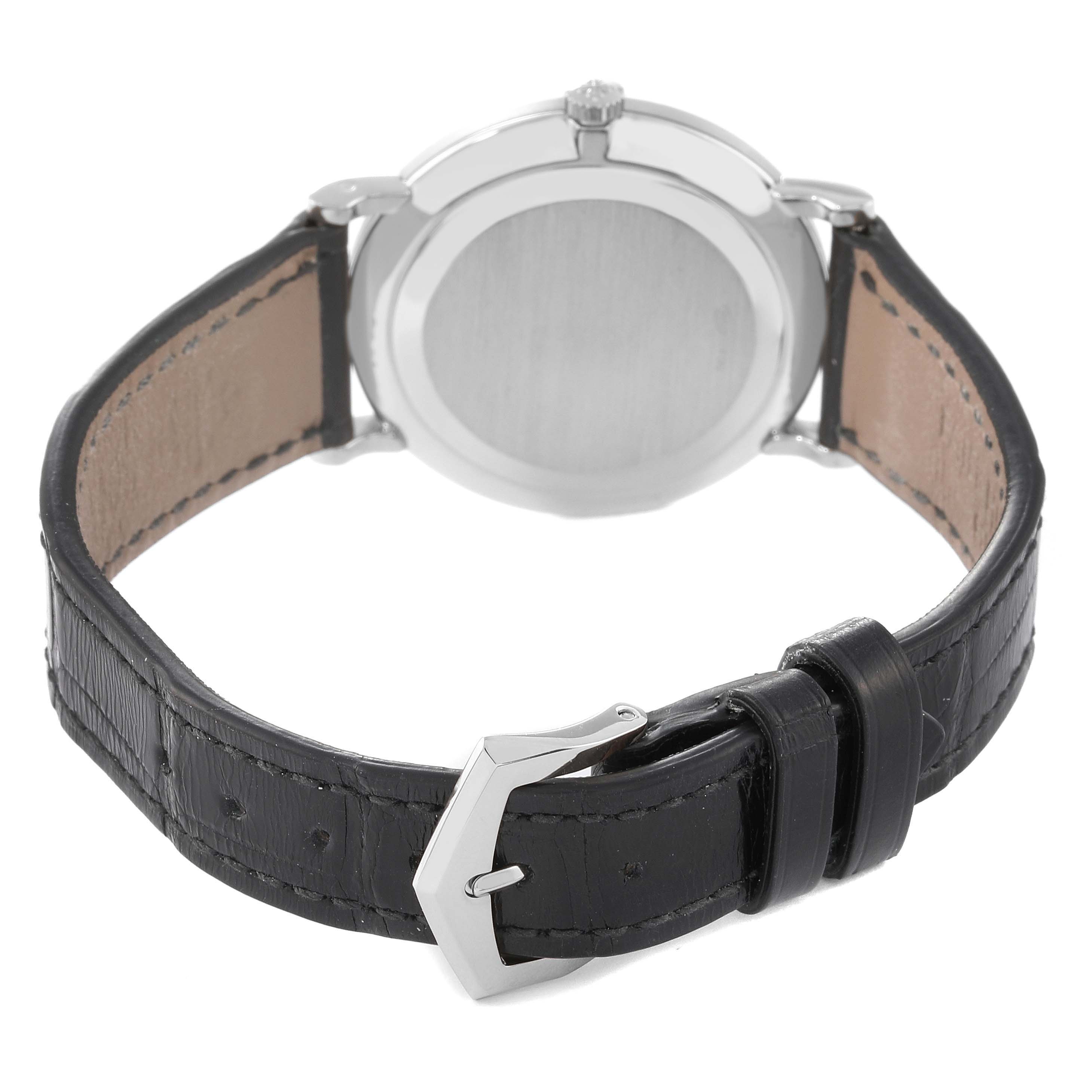 This image shows the back case and black leather strap with a buckle clasp of a Patek Philippe Calatrava 3919G-001 Men
s White Gold White Dial 3919G-001 Men
s White Gold White Dial watch.