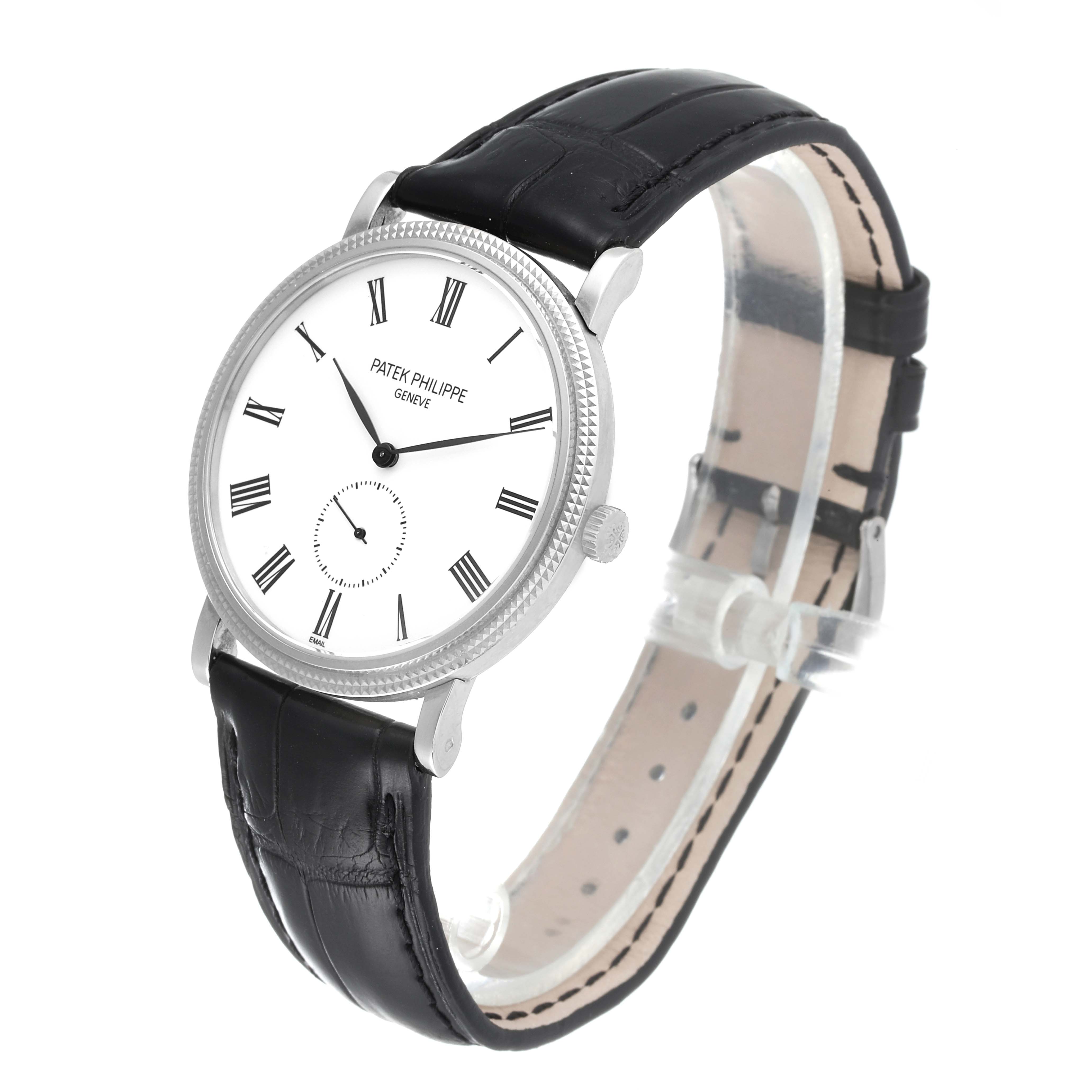 The image shows a side-angle view of a Patek Philippe Calatrava 5116G Men
s White Gold White Dial 5116G Men
s White Gold White Dial watch, displaying the dial, case, and leather strap.
