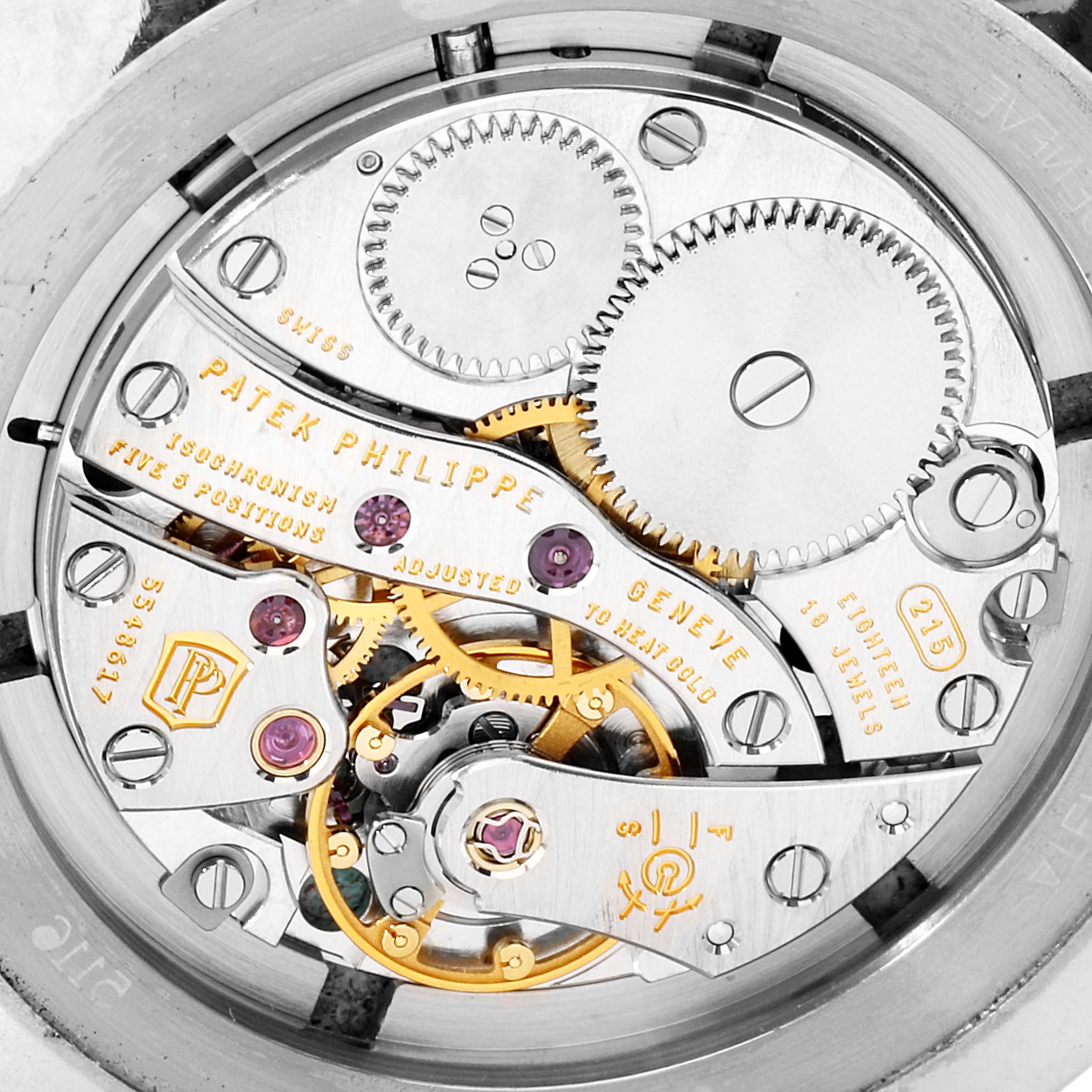 This image shows the intricate internal mechanical parts of a Patek Philippe Calatrava 5116G Men
s White Gold White Dial 5116G Men
s White Gold White Dial watch from a close-up angle.