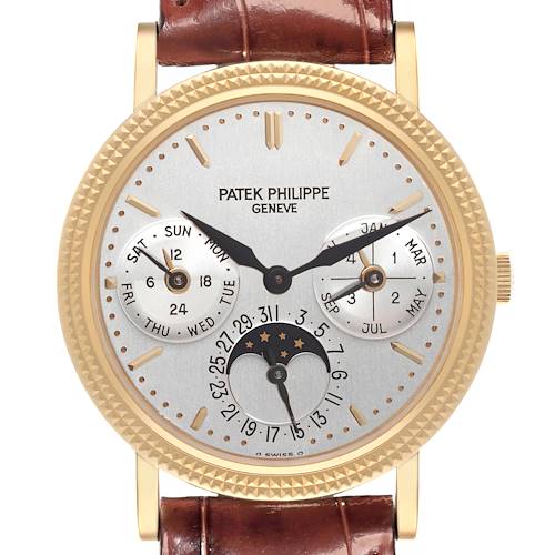 The image shows a frontal view of a Patek Philippe Complications watch, highlighting its dial, subdials, and brown leather strap.