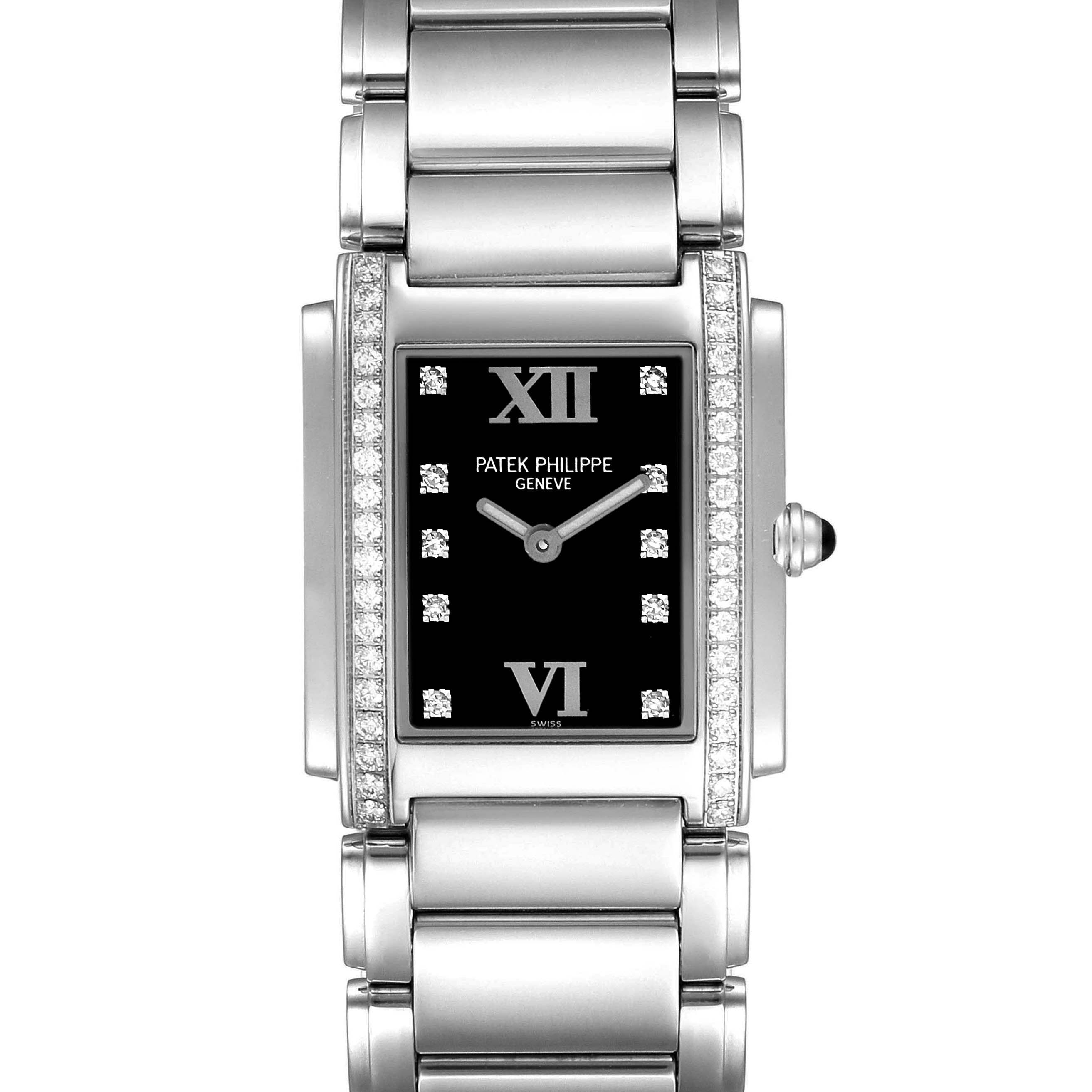 The image shows a front angle view of a Patek Philippe Twenty-4 4910 Women's Stainless Steel Black Dial 4910 Women's Stainless Steel Black Dial watch, highlighting its rectangular face, bracelet, and diamond accents.