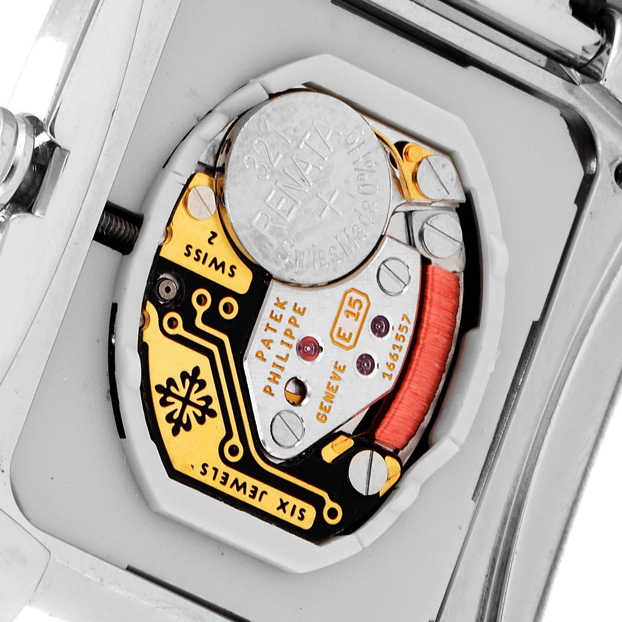 The image shows the internal mechanism and battery of a Patek Philippe Twenty-4 4910 Women's Stainless Steel Black Dial 4910 Women's Stainless Steel Black Dial watch from a close-up angle.