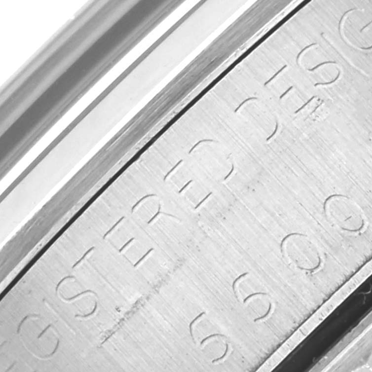 The image shows a close-up of the engraved caseback edge of a Rolex Vintage Collection 5500 Men's Stainless Steel Silver Dial 5500 Men's Stainless Steel Silver Dial watch.