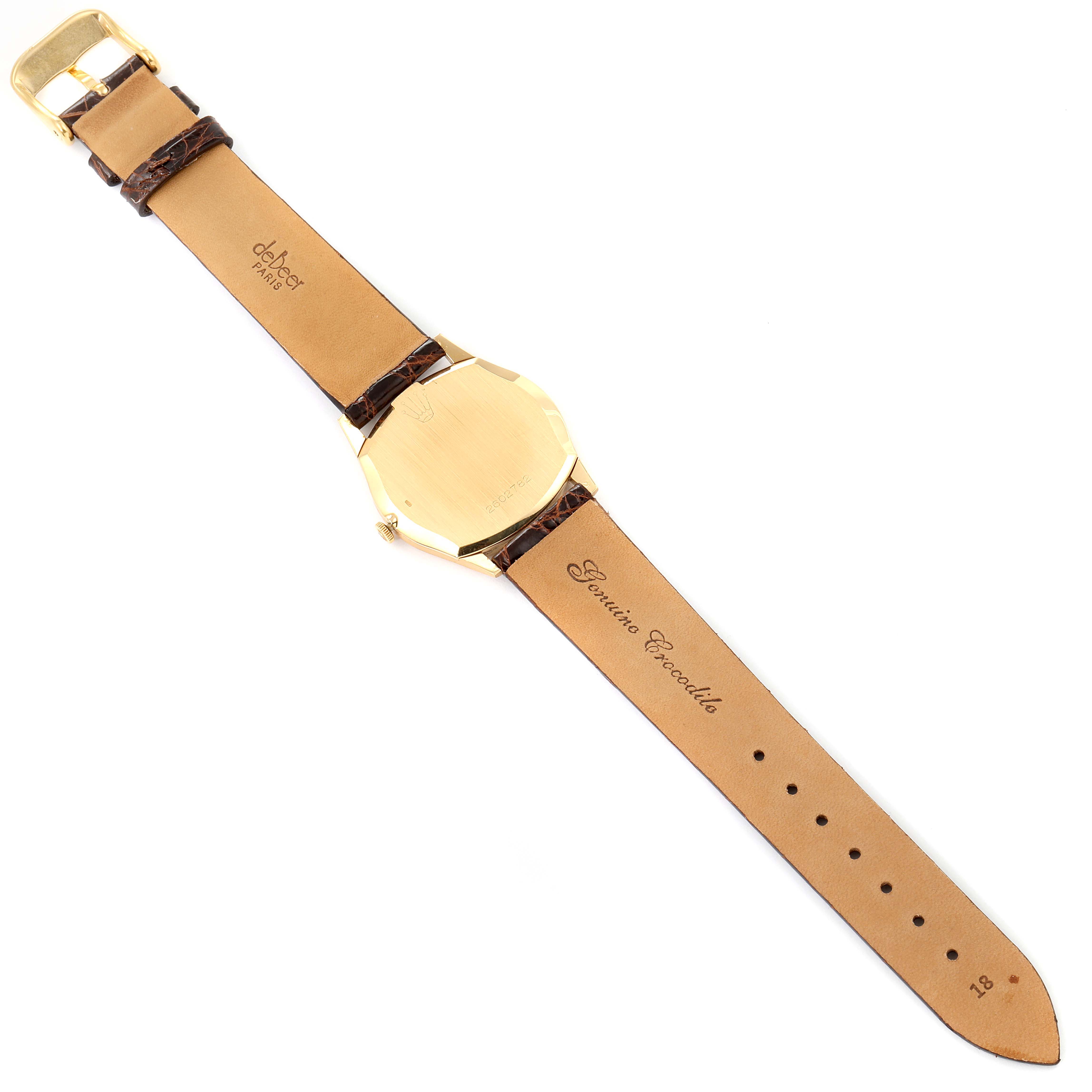 The image shows the back view of a Rolex Cellini 3804 Men's Yellow Gold Silver Dial 3804 Men's Yellow Gold Silver Dial watch with a leather strap laid flat.