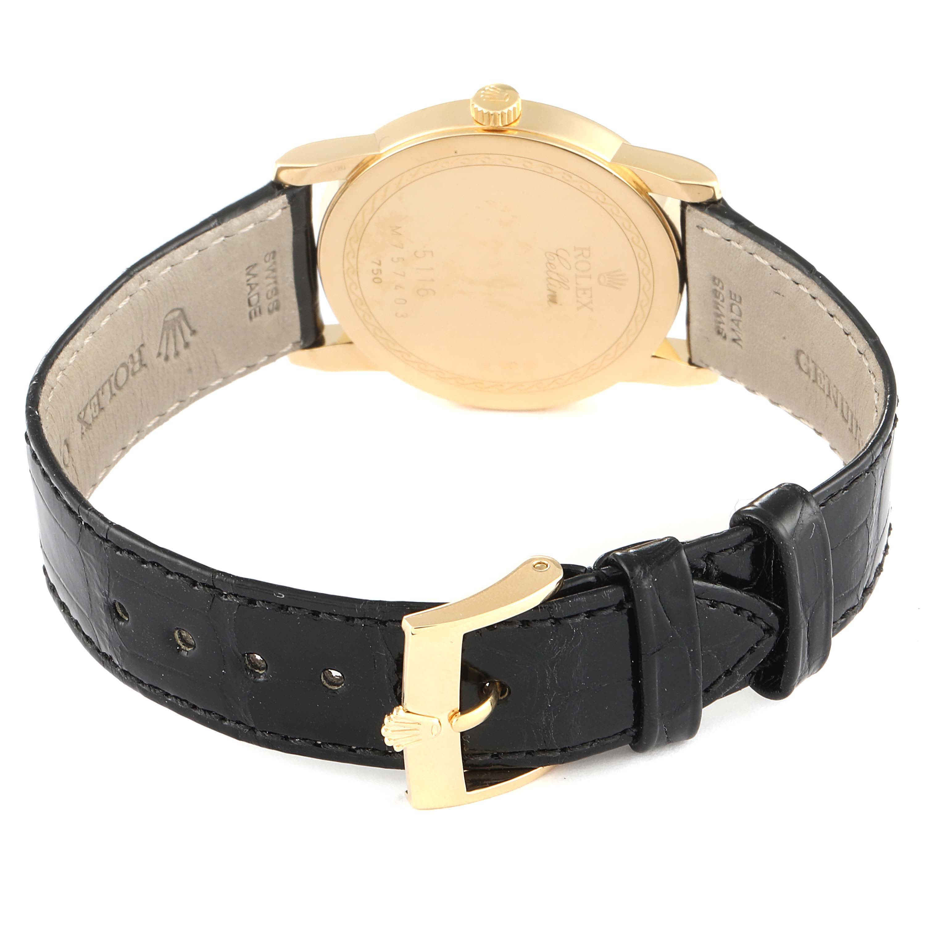 This image shows the back of a Rolex Cellini 5116 Men's Yellow Gold Champagne Dial 5116 Men's Yellow Gold Champagne Dial model watch, highlighting the case back and leather strap with a buckle.