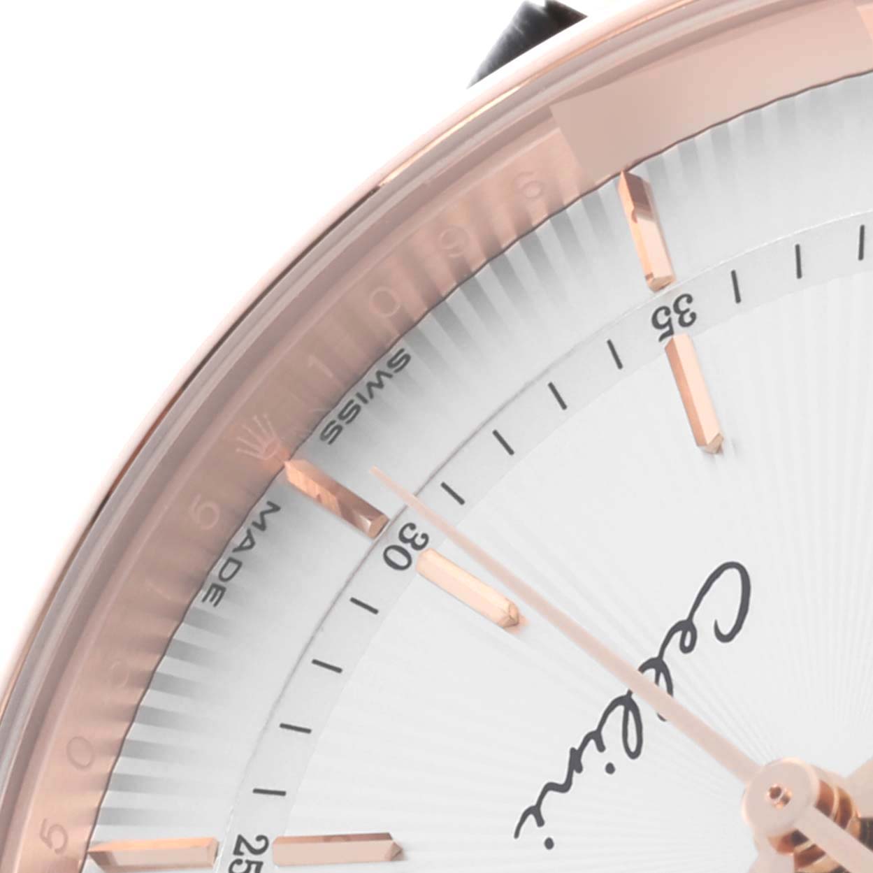 The image shows a close-up of the dial of a Rolex Cellini 50515 Men's Rose Gold Silver Dial 50515 Men's Rose Gold Silver Dial, focusing on the hands and hour markers at an angle from the top right.