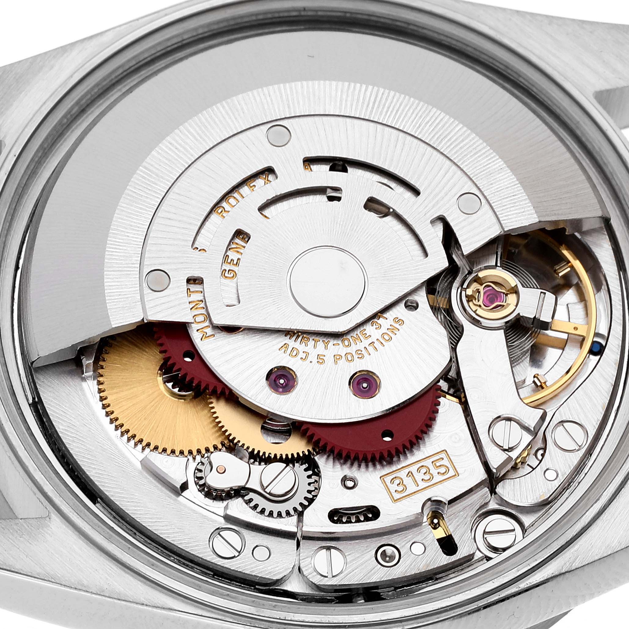 This image shows a close-up view of the internal mechanism of a Rolex Date 15210 Men's Stainless Steel Black Dial 15210 Men's Stainless Steel Black Dial model watch, focusing on the movement components.