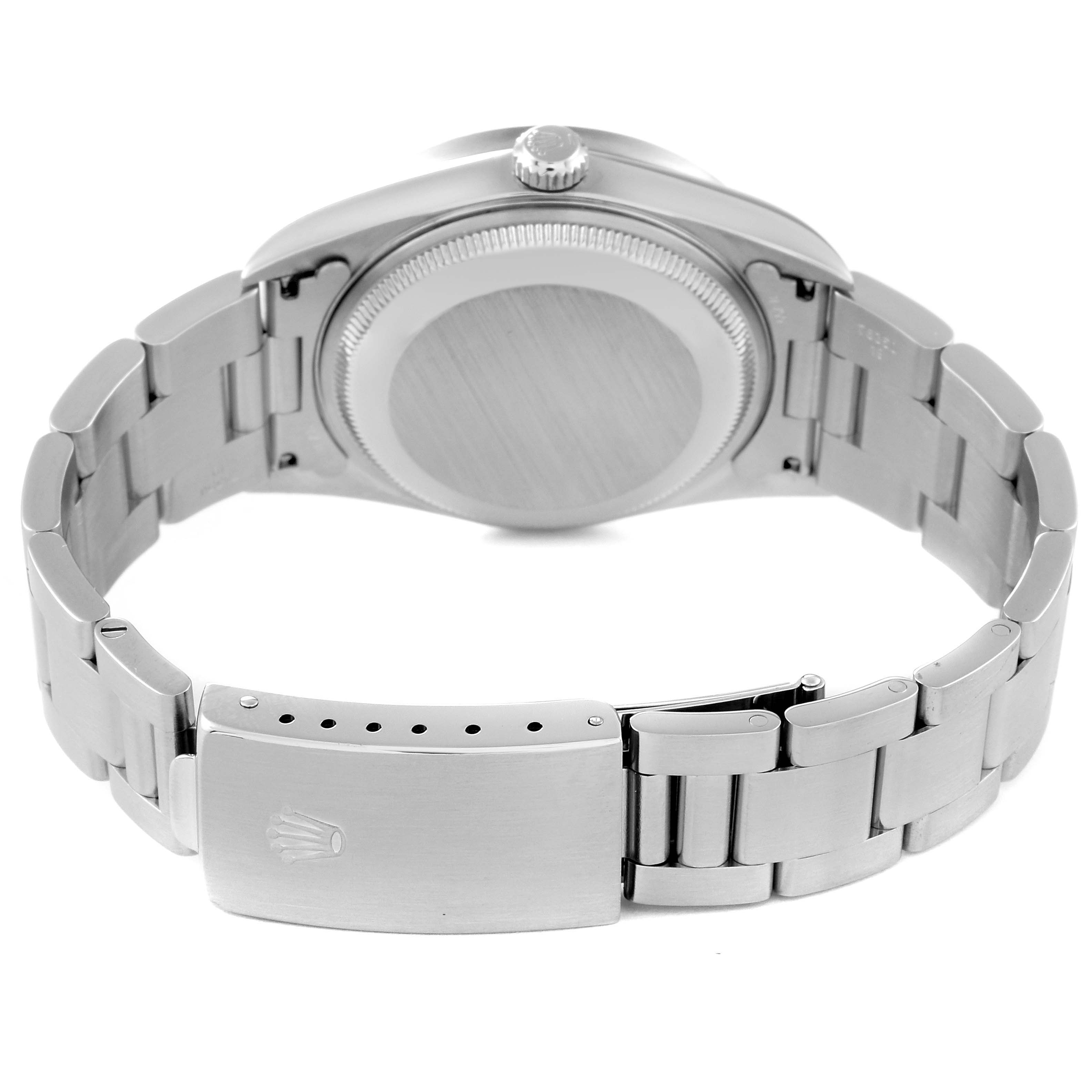 This image shows the back view of a Rolex Date 15210 Men's Stainless Steel Black Dial 15210 Men's Stainless Steel Black Dial model watch, highlighting the case back and bracelet clasp.