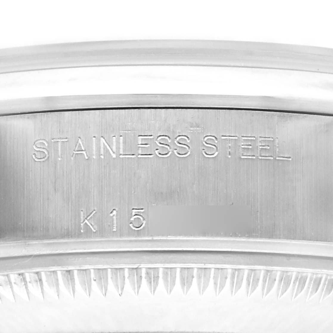 The image shows the side profile of a stainless steel case back for a Rolex Date 79160 Women's Stainless Steel Black Dial 79160 Women's Stainless Steel Black Dial model watch.