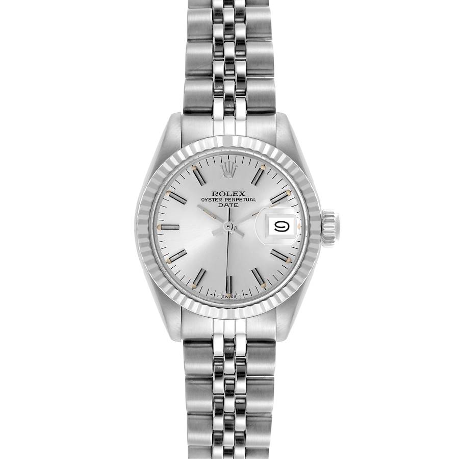 The Rolex Date watch is shown from a top-down angle, displaying the dial, bezel, bracelet, and crown.