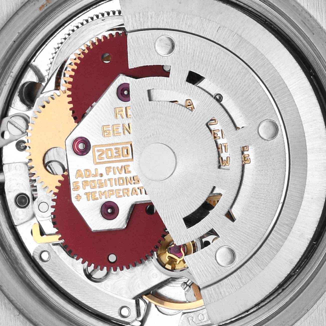 This image shows the movement mechanism of a Rolex Date 6917 Women's Stainless Steel Silver Dial 6917 Women's Stainless Steel Silver Dial watch, highlighting gears and the rotor from a top-down angle.