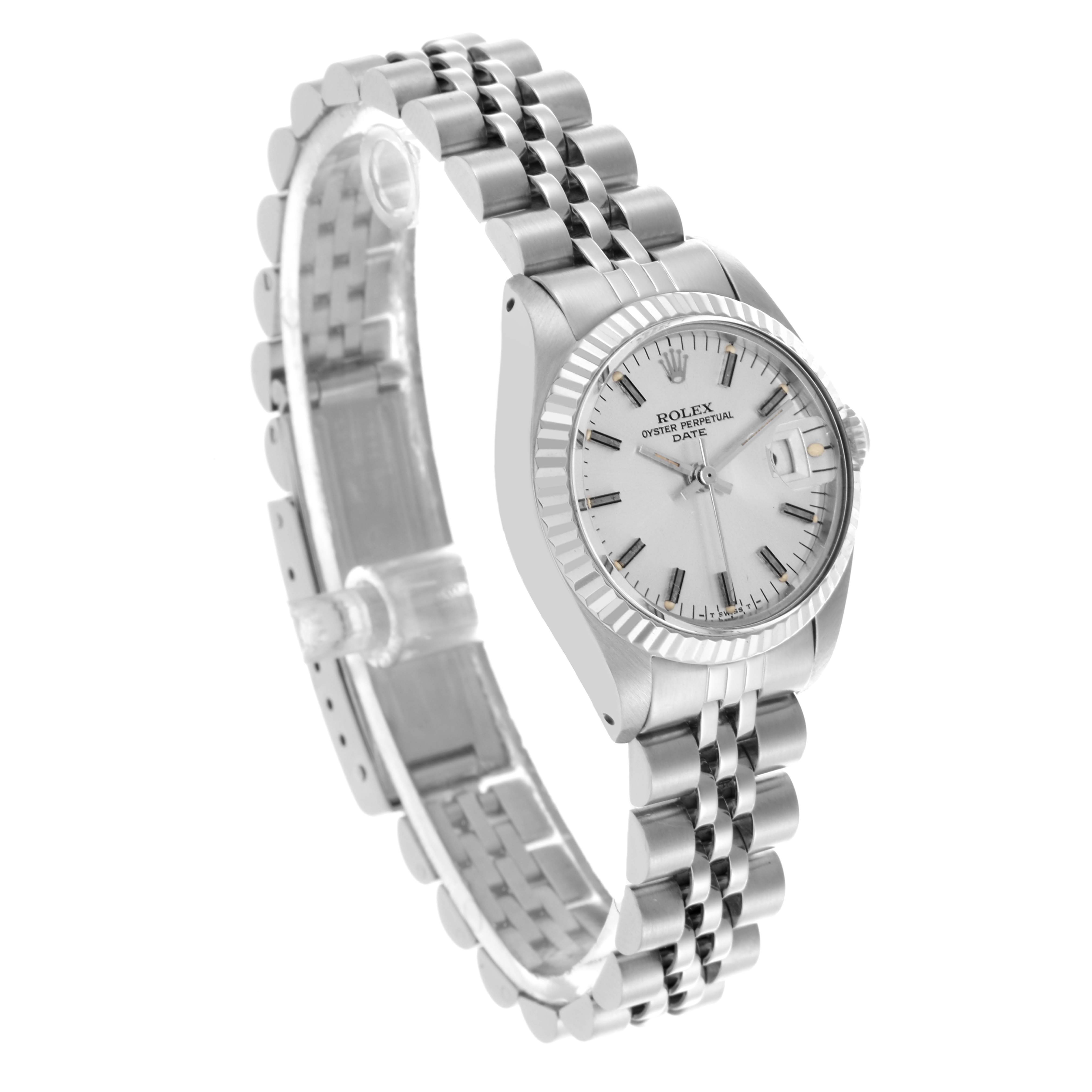 The Rolex Date 6917 Women's Stainless Steel Silver Dial 6917 Women's Stainless Steel Silver Dial watch is shown at an angled side view, highlighting its bracelet, bezel, and dial.