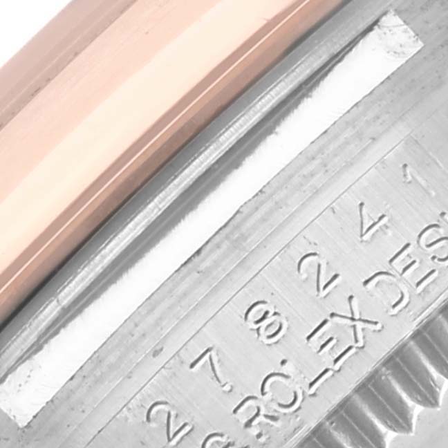 The image shows a close-up of the watch's side, focusing on the engraved inner rim of the Rolex Mid-Size 278241 Women's Steel and Gold (two tone) Pink Dial 278241 Women's Steel and Gold (two tone) Pink Dial model.