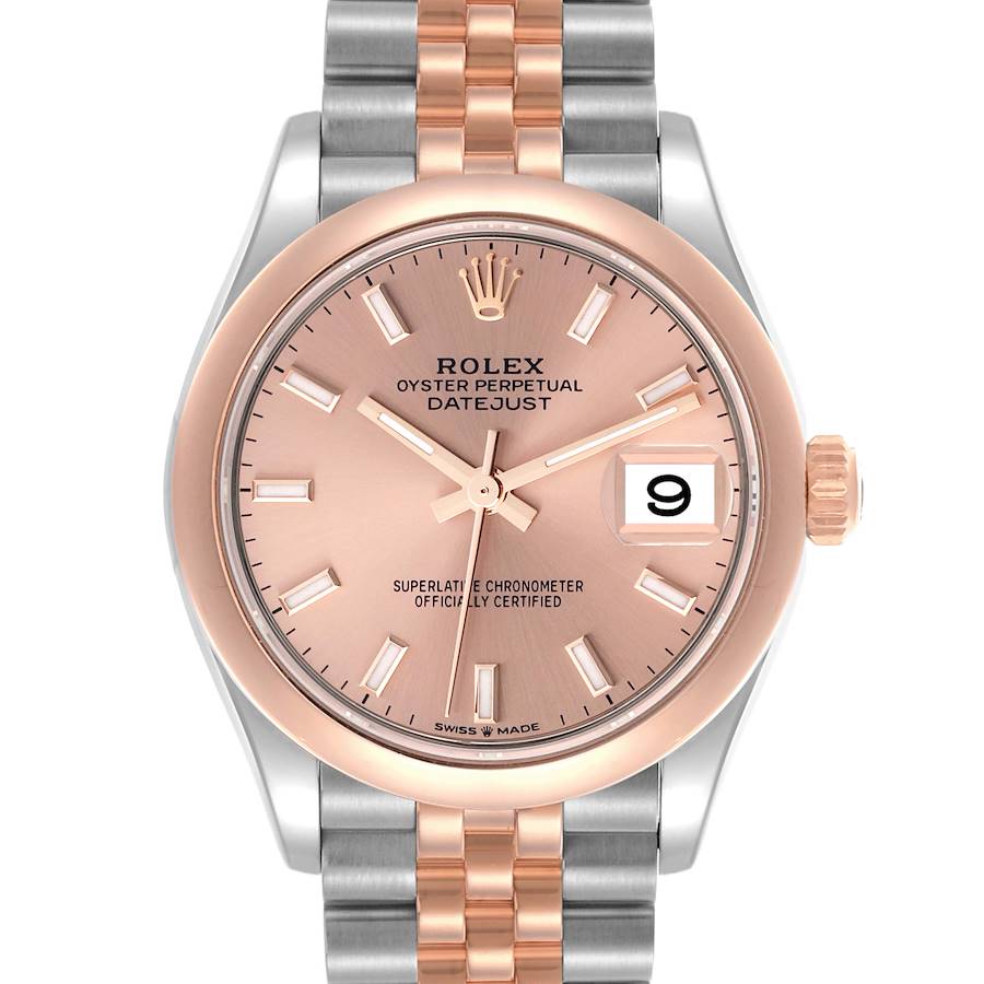 The Rolex Mid-Size Datejust watch is shown from a front view, highlighting the dial, bezel, and bracelet.