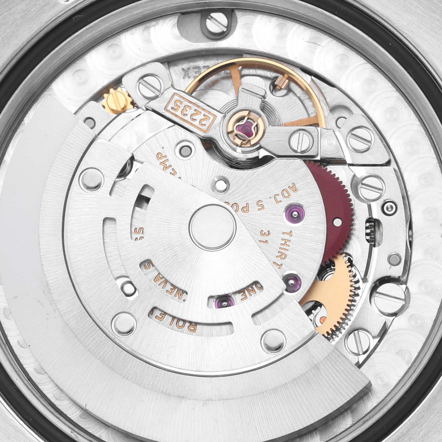 The image shows the movement mechanism of a Rolex Mid-Size 178344 Women's Stainless Steel Mother of Pearl Dial 178344 Women's Stainless Steel Mother of Pearl Dial watch from a top-down angle, highlighting gears and rotor.