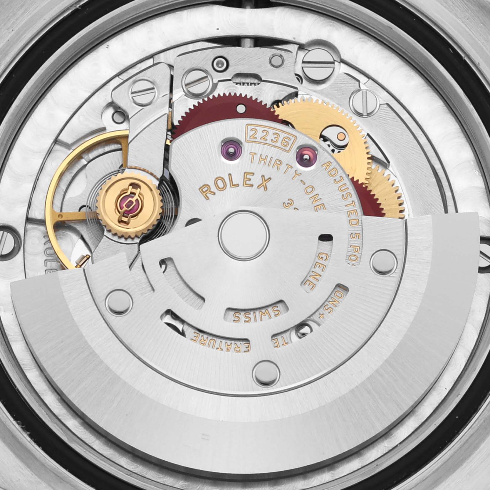 The image shows the internal mechanism of a Rolex Mid-Size 68032 Women's Steel and Gold (two tone) Champagne Dial 68032 Women's Steel and Gold (two tone) Champagne Dial watch, viewed from above, showcasing gears and the rotor.