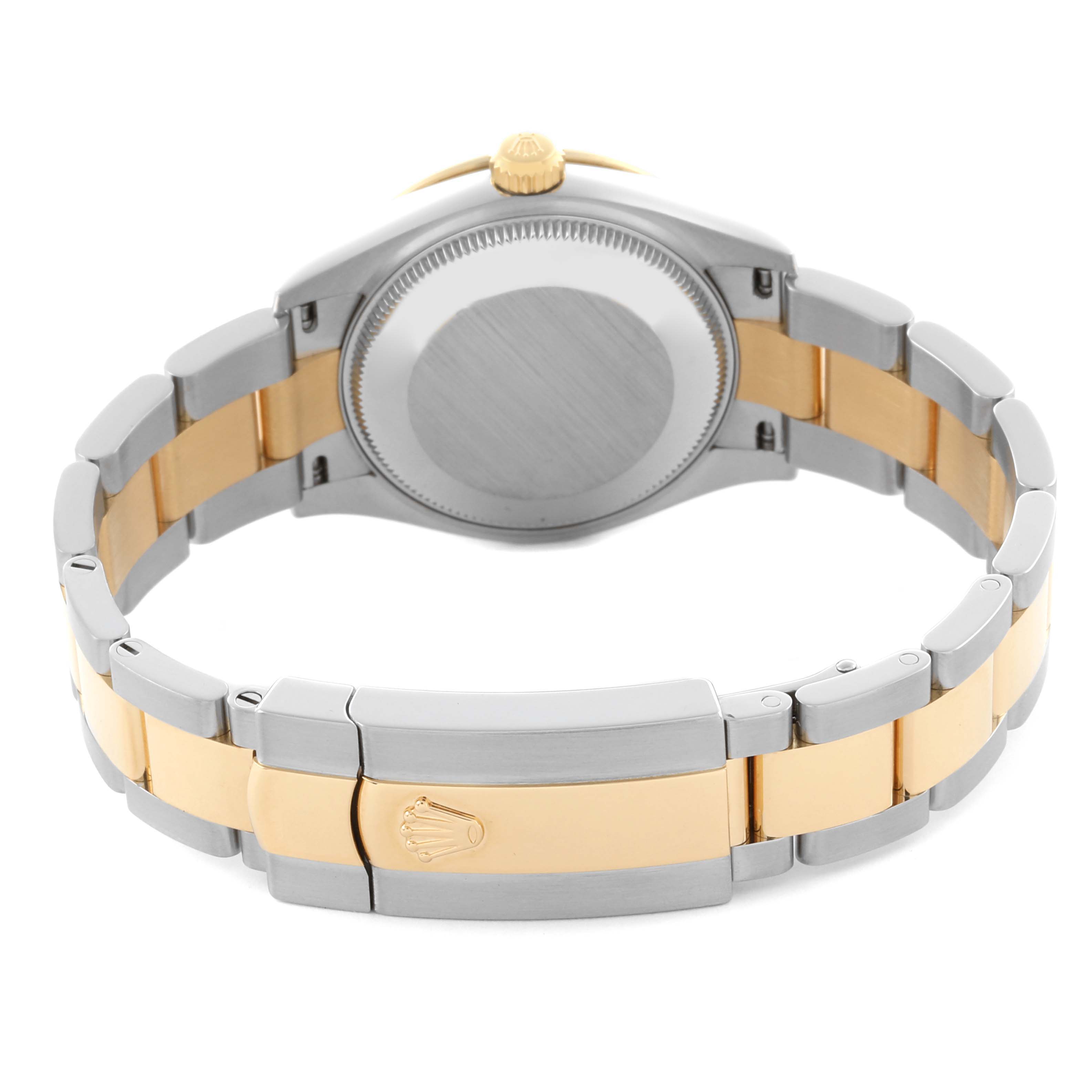 The Rolex Mid-Size 68032 Women's Steel and Gold (two tone) Champagne Dial 68032 Women's Steel and Gold (two tone) Champagne Dial watch is shown from the rear, highlighting the case back, crown, and two-tone bracelet.