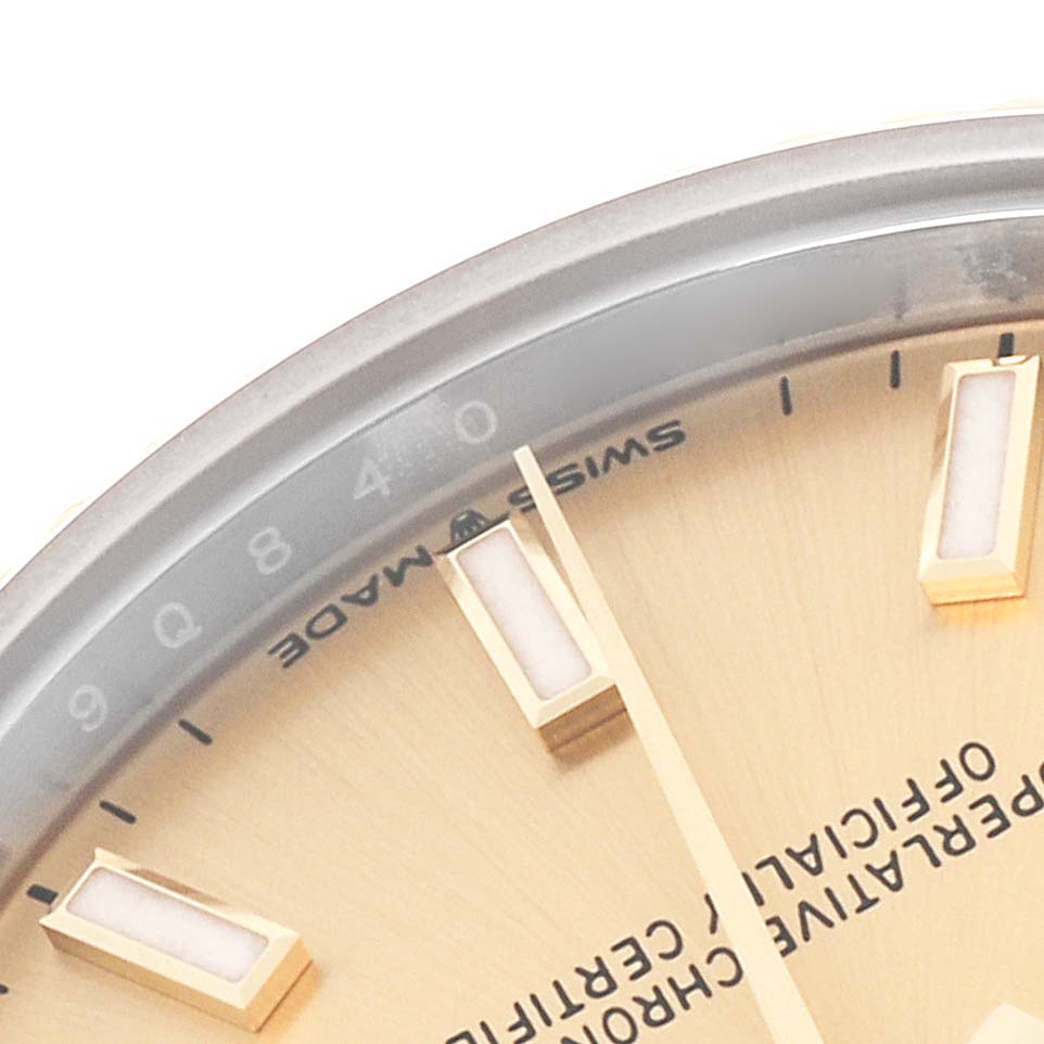 The image shows a close-up of the dial and bezel of a Rolex Mid-Size 278273 Women's Steel and Gold (two tone) Champagne Dial 278273 Women's Steel and Gold (two tone) Champagne Dial watch from an angled view.