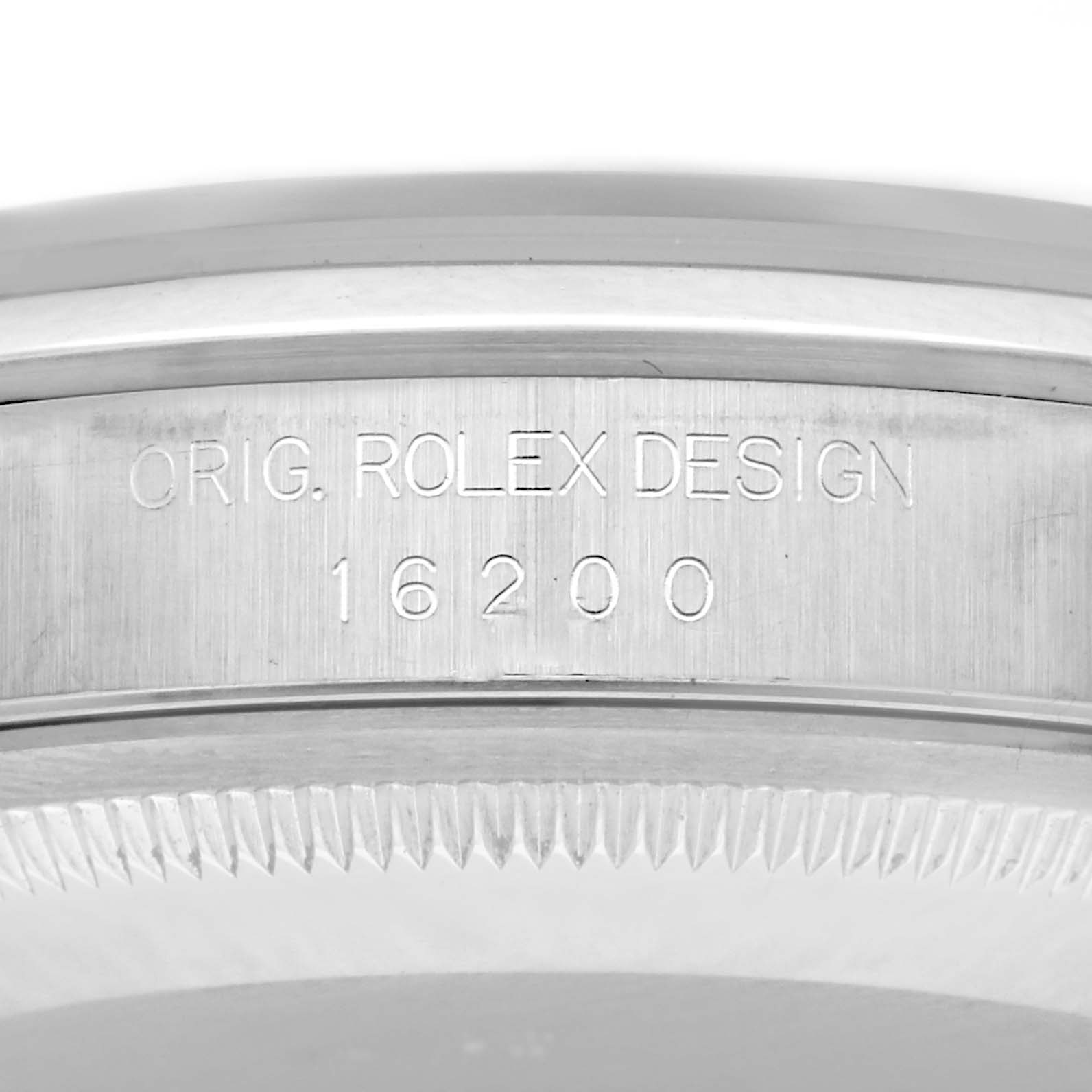 The image shows a close-up of the case side of a Rolex Datejust 16200 Men's Stainless Steel Black Dial 16200 Men's Stainless Steel Black Dial, highlighting the engraved reference number.