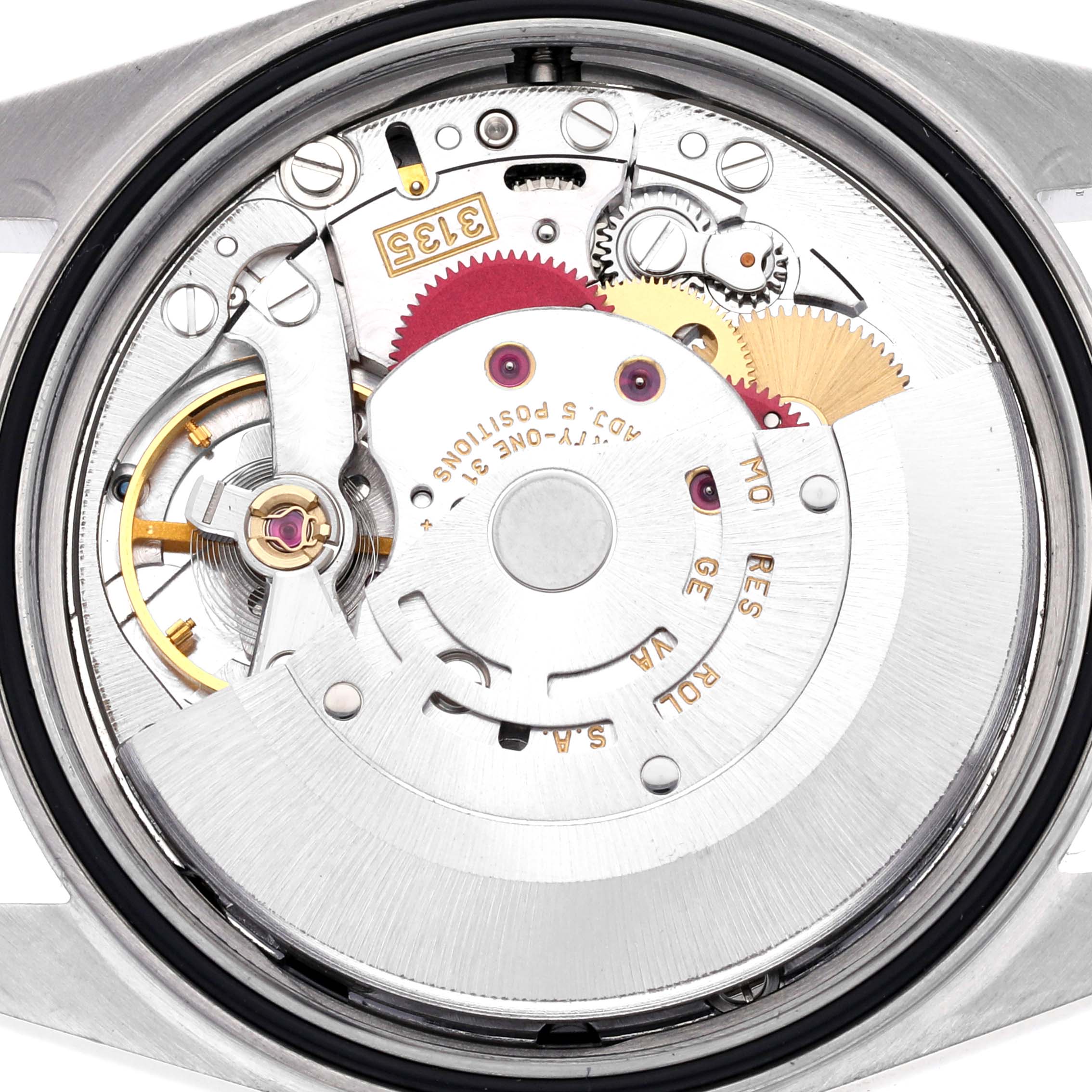 The image shows the movement of a Rolex Datejust 16200 Men's Stainless Steel Black Dial 16200 Men's Stainless Steel Black Dial watch from the back, highlighting its intricate mechanical parts.
