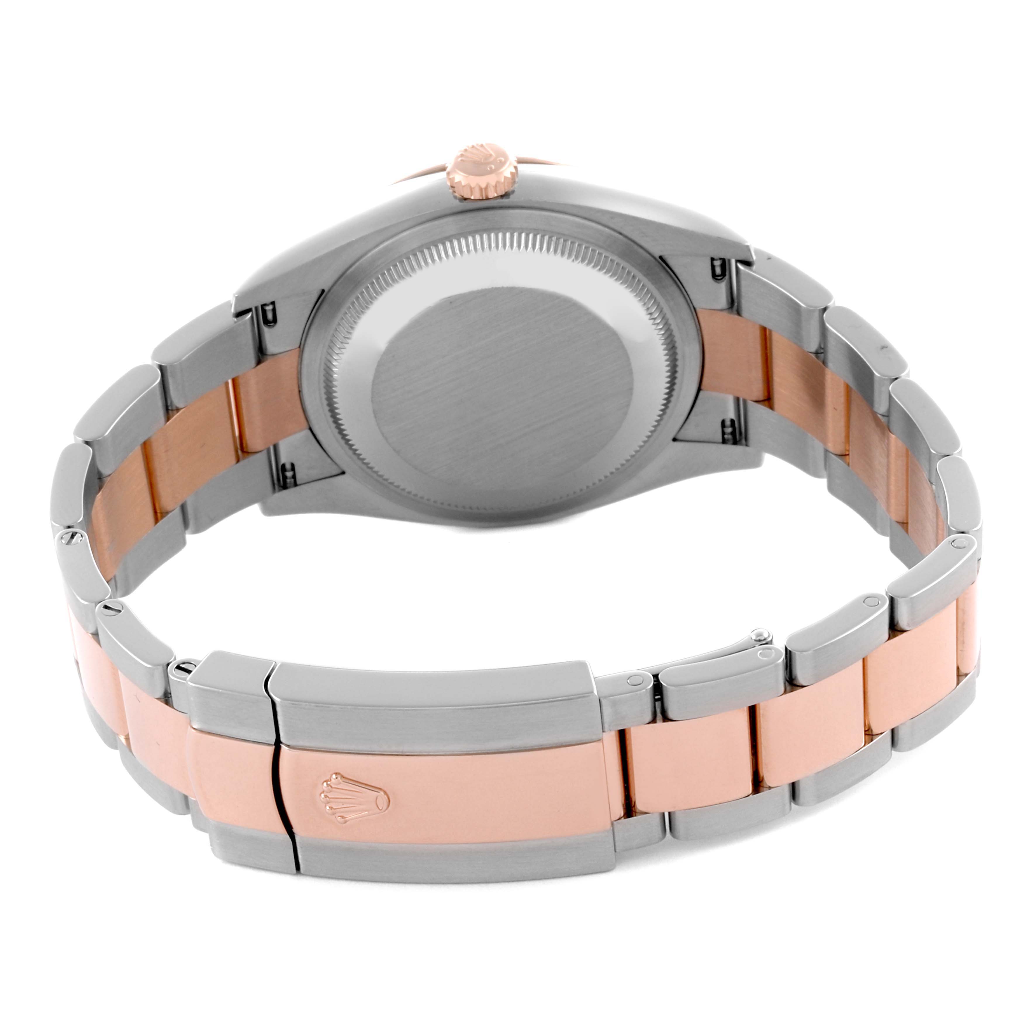 The image shows the back case and bracelet of a Rolex Datejust 126231 Men's Steel and Gold (two tone) Grey Dial 126231 Men's Steel and Gold (two tone) Grey Dial watch, highlighting its two-tone metal design.