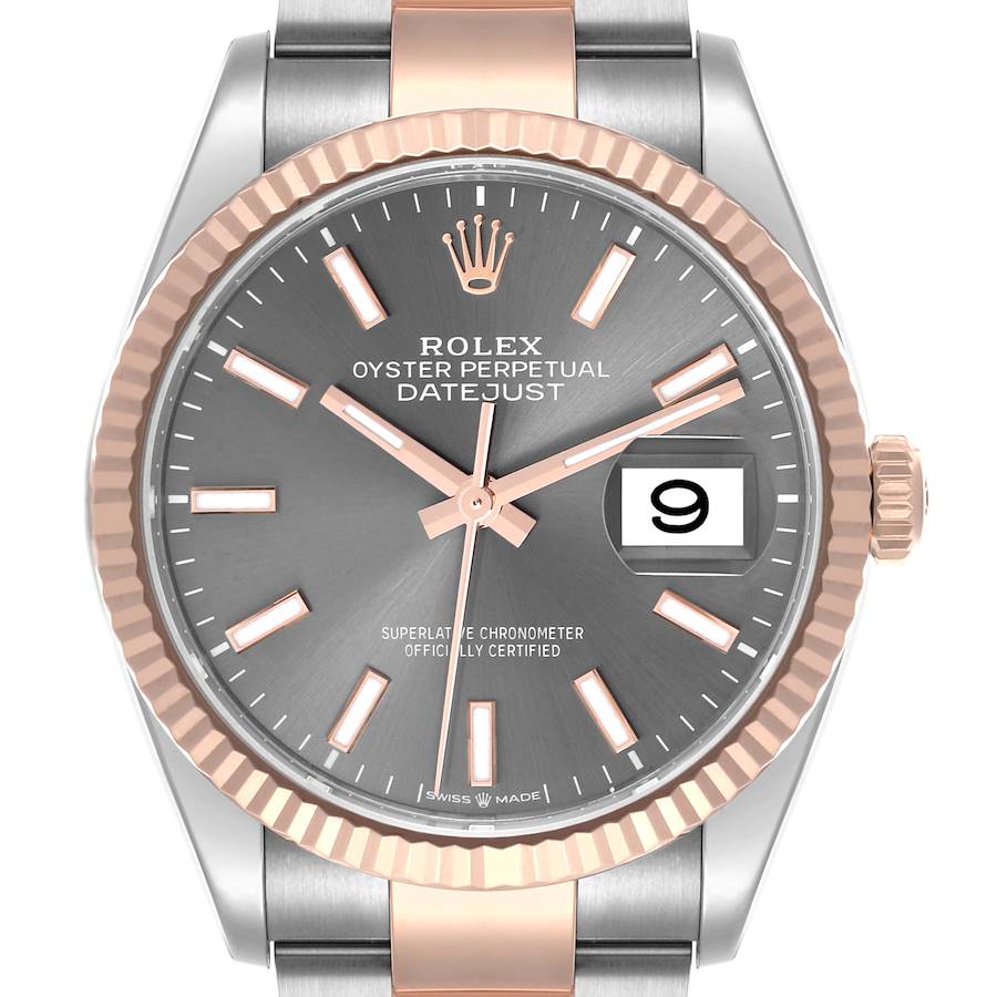 The Rolex Datejust watch is shown from the front, highlighting the dial, bezel, and part of the bracelet.