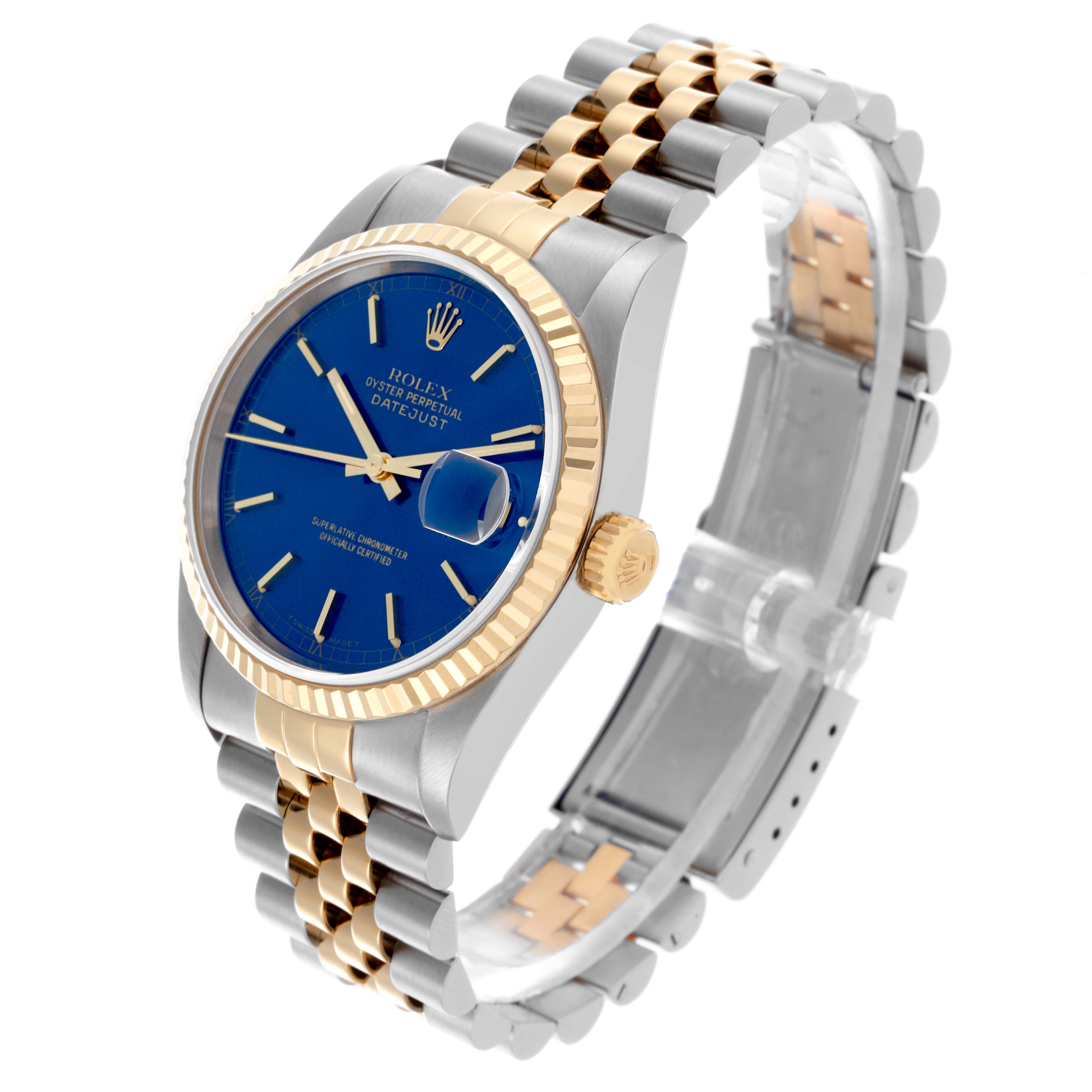 The Rolex Datejust 16233 Men's Steel and Gold (two tone) Blue Dial 16233 Men's Steel and Gold (two tone) Blue Dial watch is shown at a three-quarter angle, highlighting the blue dial, two-tone bracelet, and fluted bezel.