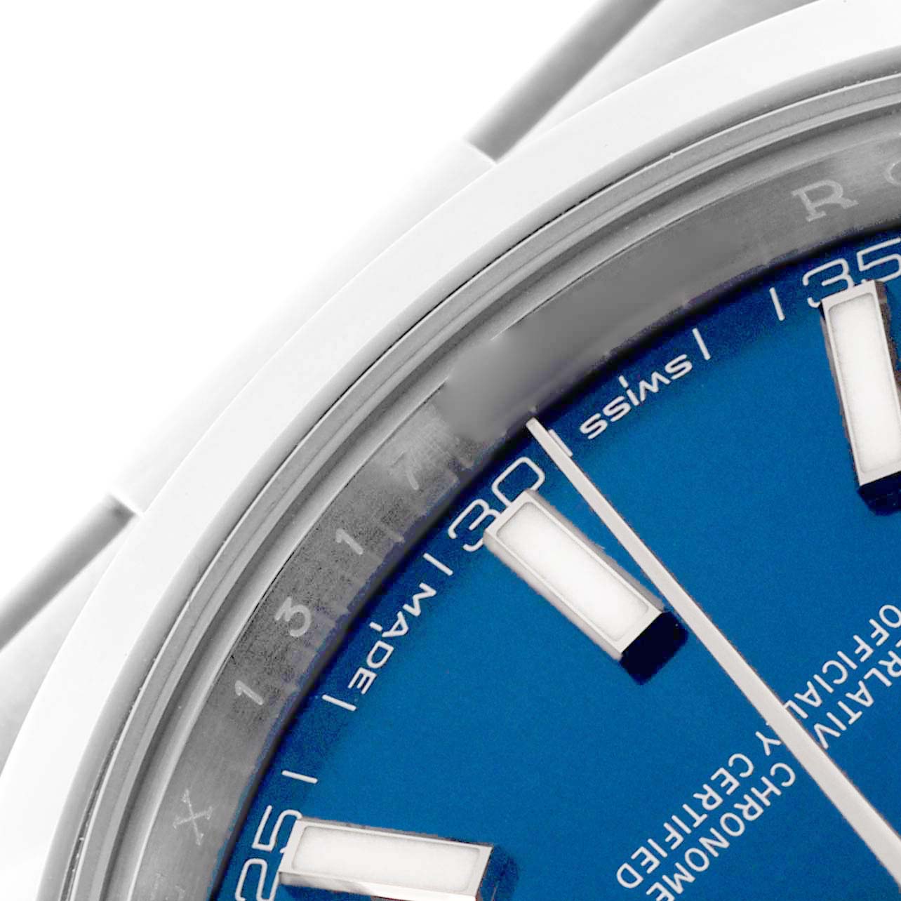 The image shows a close-up of the Rolex Datejust 41 126300 Men's Stainless Steel Blue Dial 126300 Men's Stainless Steel Blue Dial, highlighting the blue dial, markers, and partial bezel.
