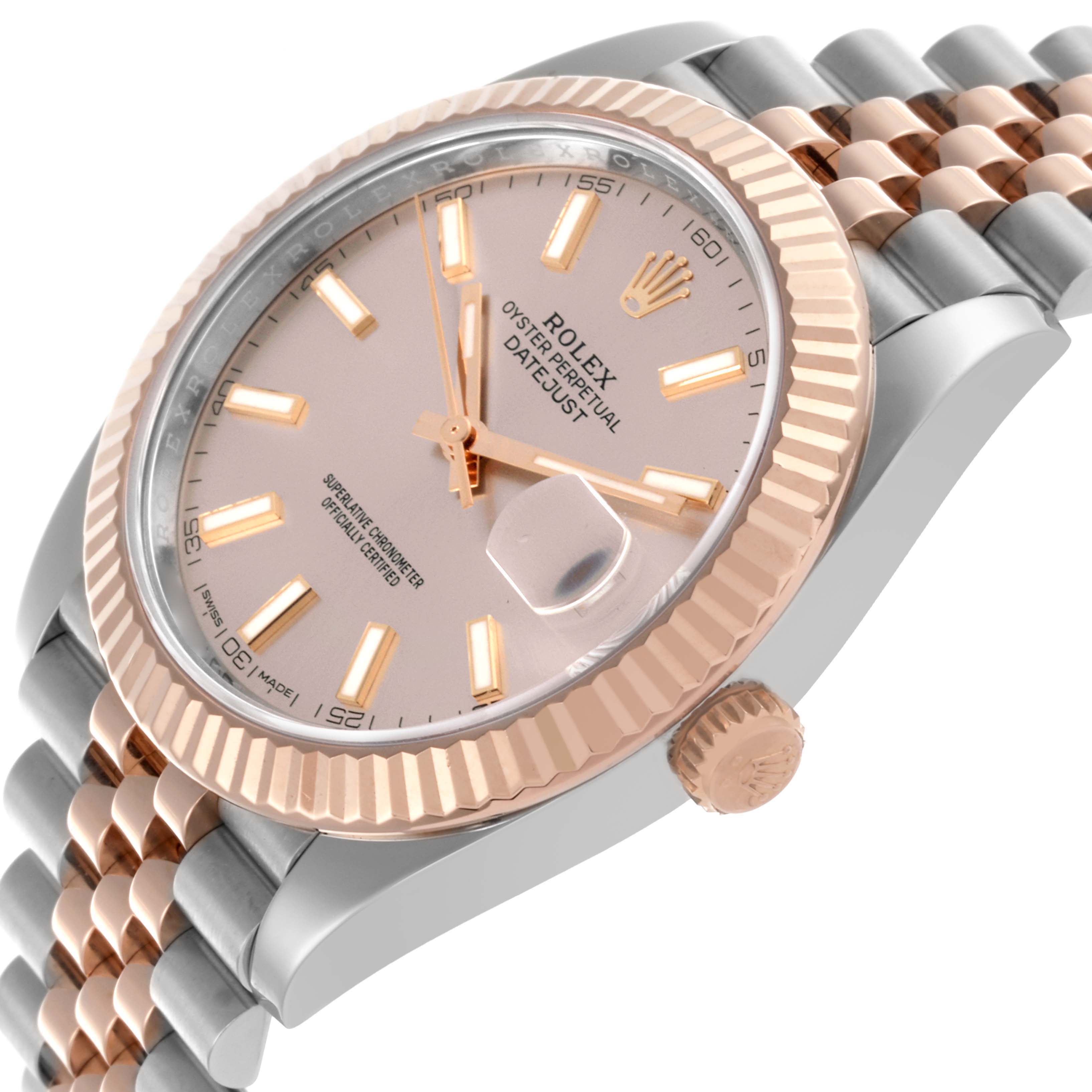 The image shows a Rolex Datejust 41 126331 Men's Steel and Gold (two tone) Pink Dial 126331 Men's Steel and Gold (two tone) Pink Dial watch at a side angle, highlighting the bezel, dial, crown, and part of the bracelet.