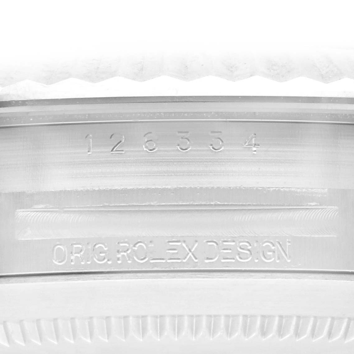 The image shows the side engraving of the case on a Rolex Datejust 41 126334 Men
s Stainless Steel Blue Dial 126334 Men
s Stainless Steel Blue Dial, featuring the model number and branding.