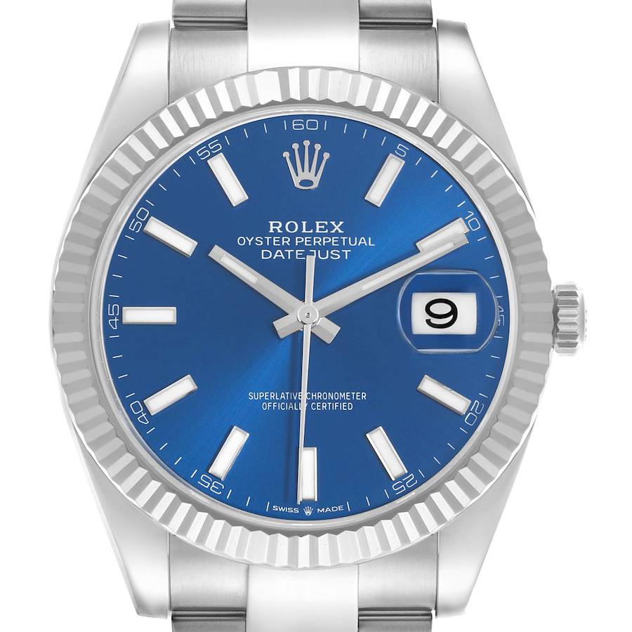 The image shows a front view of the Rolex Datejust 41, highlighting the blue dial, date window, and fluted bezel.