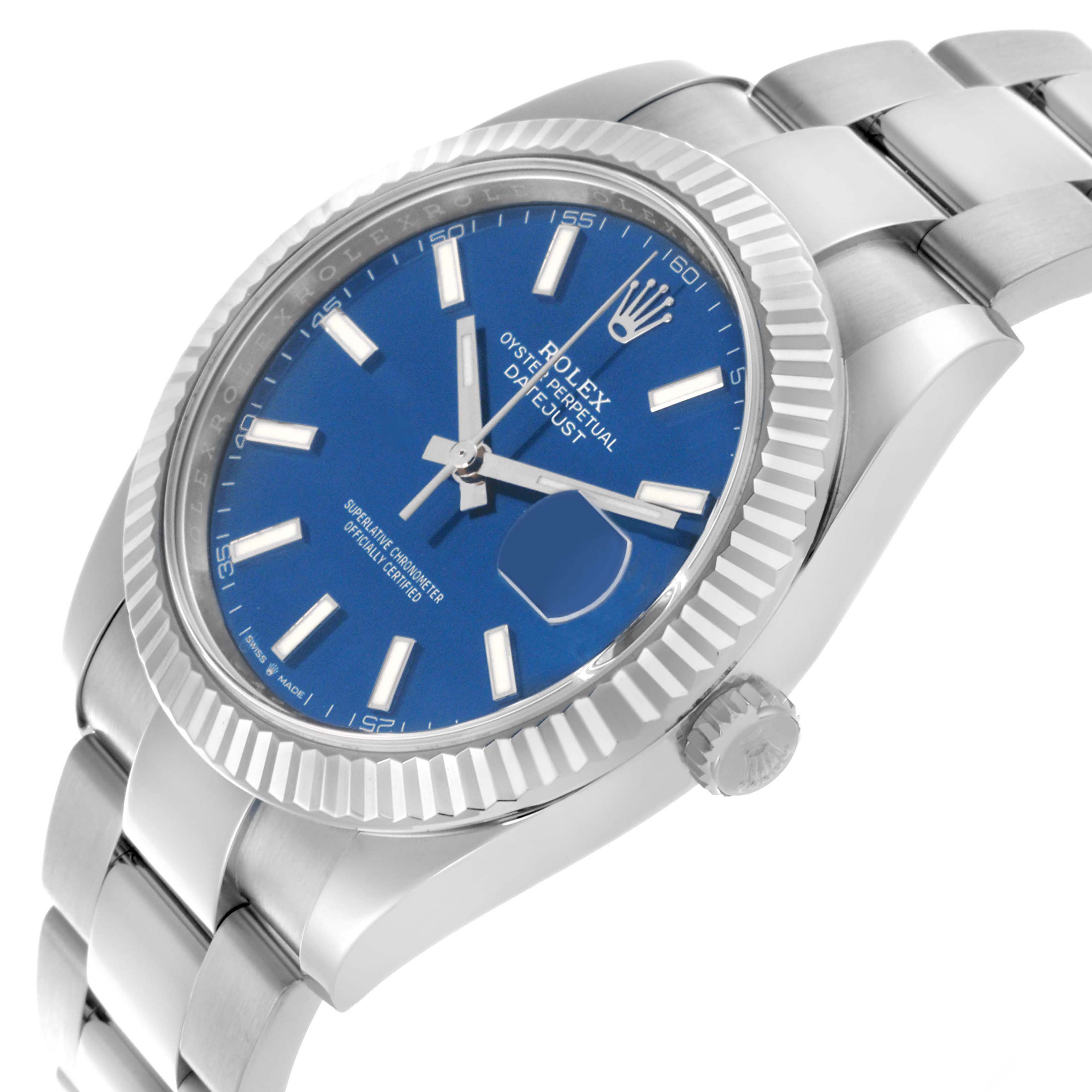The Rolex Datejust 41 126334 Men
s Stainless Steel Blue Dial 126334 Men
s Stainless Steel Blue Dial watch is shown at a slight angle highlighting the blue dial, fluted bezel, and part of the bracelet.