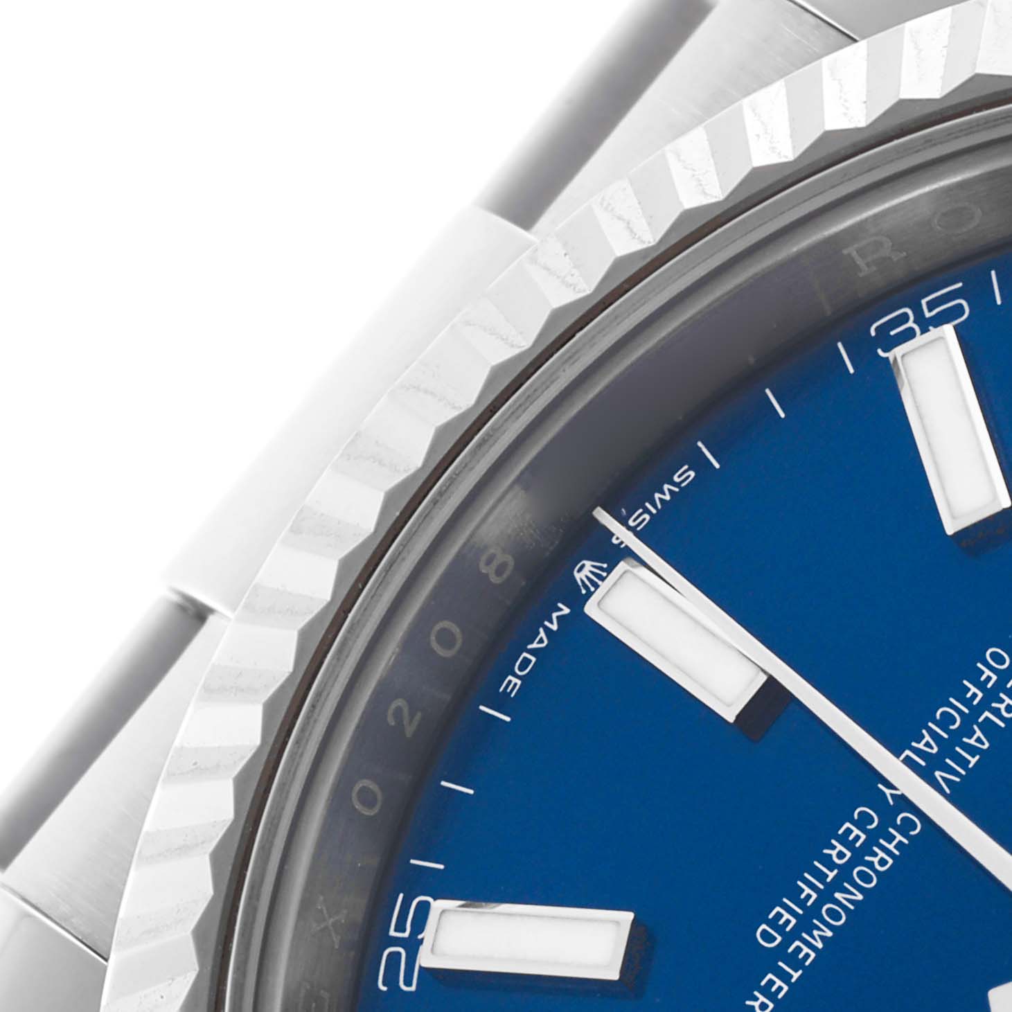 The image shows a close-up of the Rolex Datejust 41 126334 Men
s Stainless Steel Blue Dial 126334 Men
s Stainless Steel Blue Dial, displaying part of the blue dial, fluted bezel, and stainless steel case.