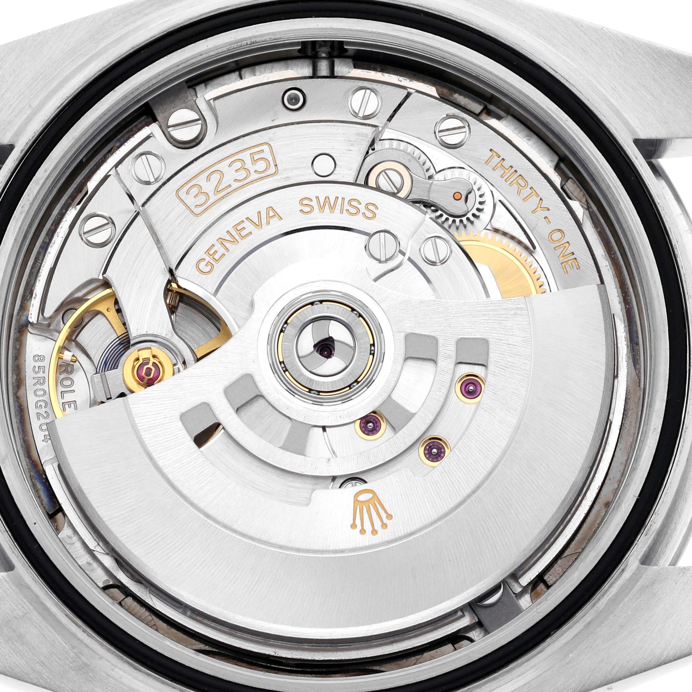 The image shows the movement of a Rolex Datejust 41 126300 Men's Stainless Steel Grey Dial 126300 Men's Stainless Steel Grey Dial, viewed from the back, highlighting internal gears and components.