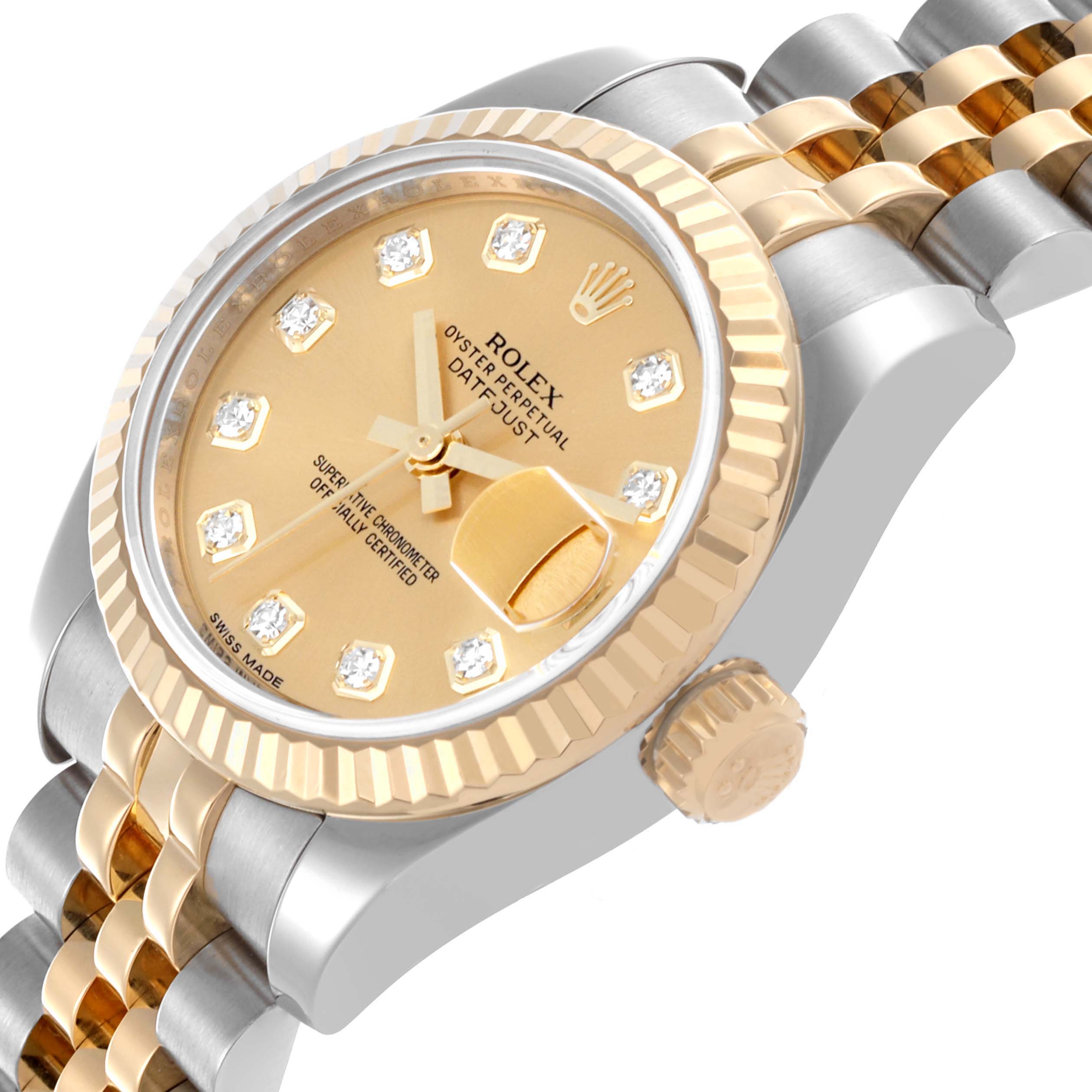 The Rolex Datejust 179173 Women's Steel and Gold (two tone) Champagne Dial 179173 Women's Steel and Gold (two tone) Champagne Dial watch is shown at an angled view highlighting the dial, crown, and part of the bracelet.
