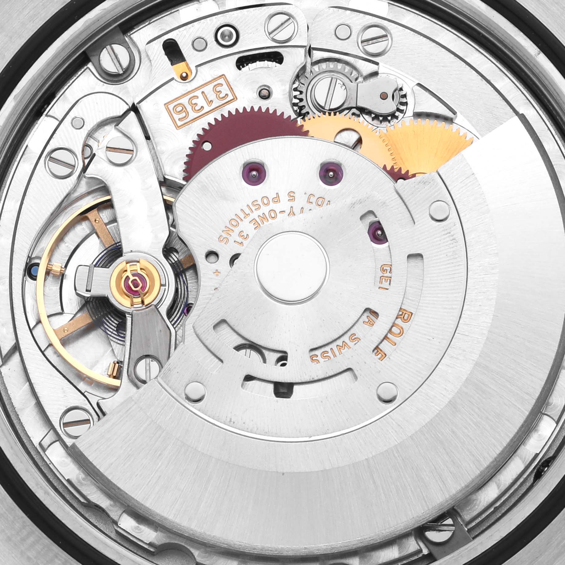 The image shows a close-up of the Rolex Datejust 41 116333 Men's Steel and Gold (two tone) Champagne Dial 116333 Men's Steel and Gold (two tone) Champagne Dial's movement, highlighting gears and intricate mechanical parts.