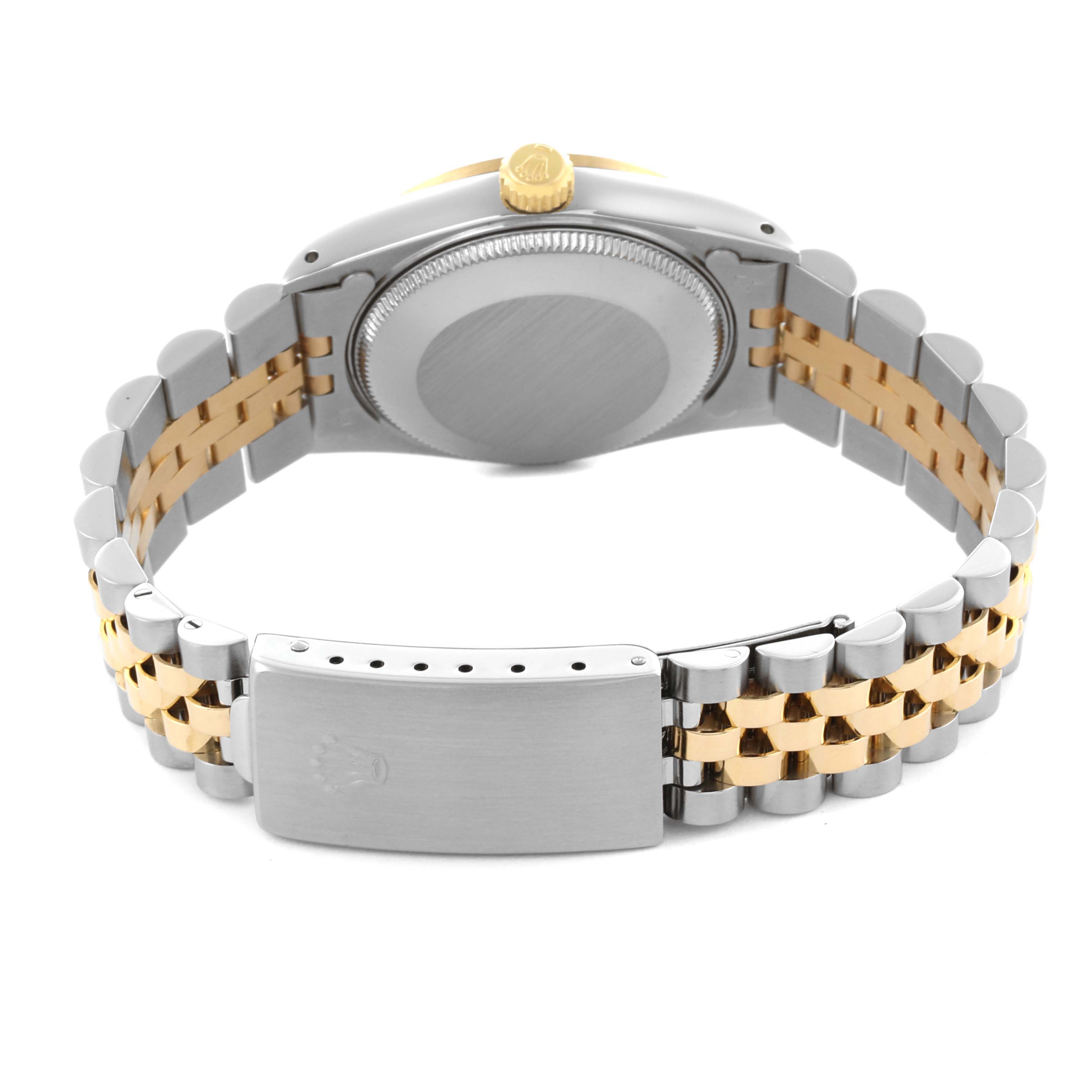 The image shows a Rolex Mid-Size 68273 Women's Steel and Gold (two tone) White Dial 68273 Women's Steel and Gold (two tone) White Dial watch from a rear angle, highlighting the case back, crown, and two-tone bracelet with clasp.