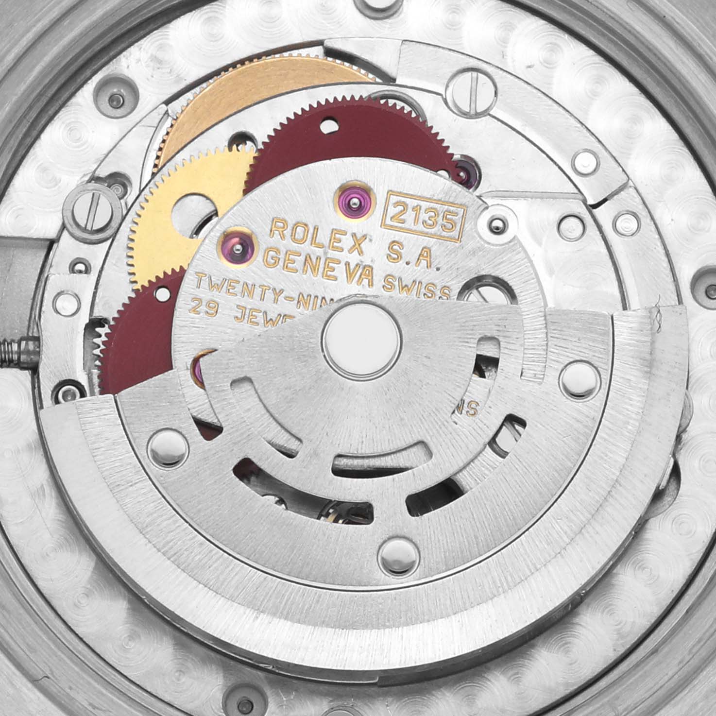 The image shows a detailed view of the Rolex Mid-Size 68273 Women's Steel and Gold (two tone) White Dial 68273 Women's Steel and Gold (two tone) White Dial model's movement, highlighting gears and the rotor mechanism.