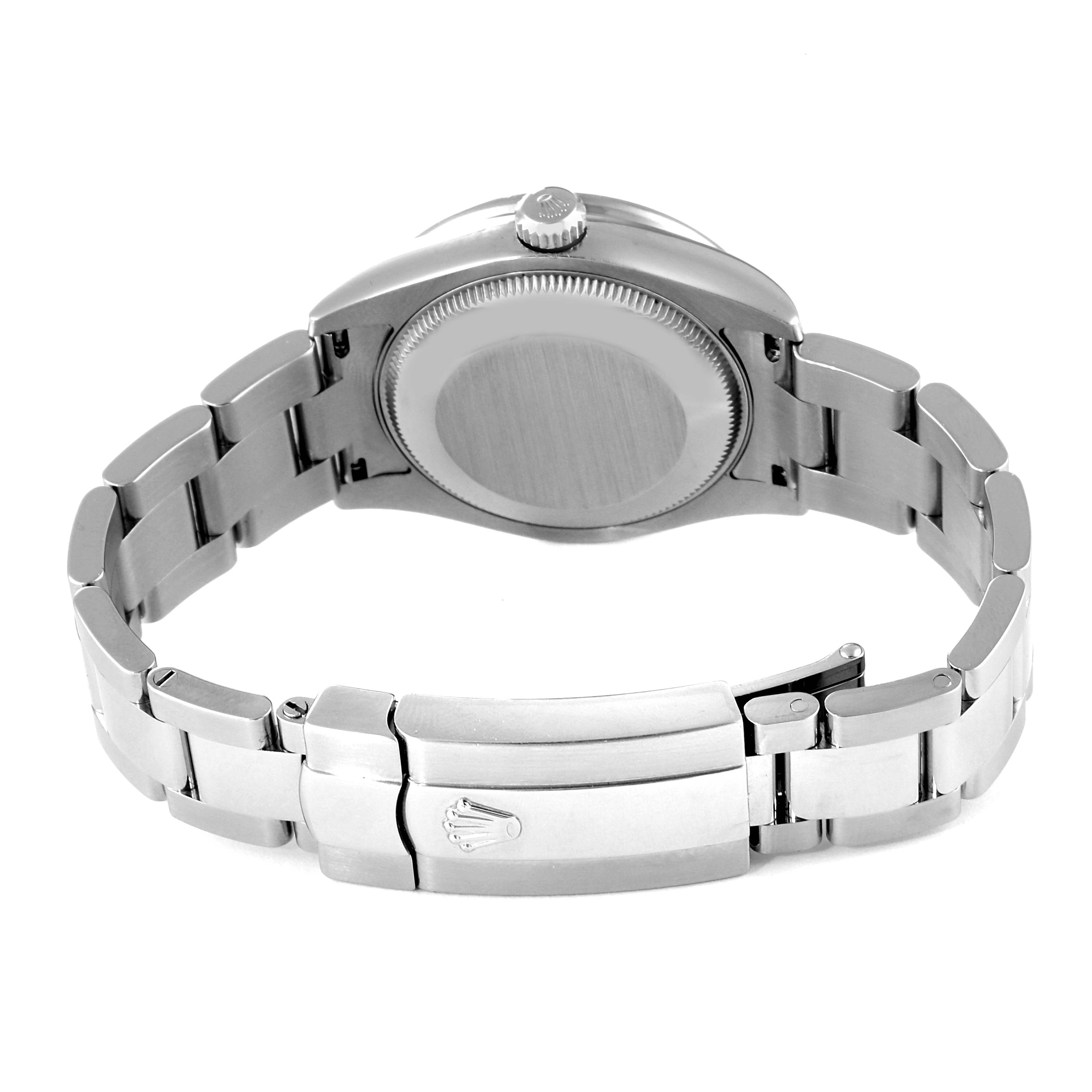 The image shows the back view of a Mid-Size Rolex watch, highlighting the bracelet, clasp, and case back.