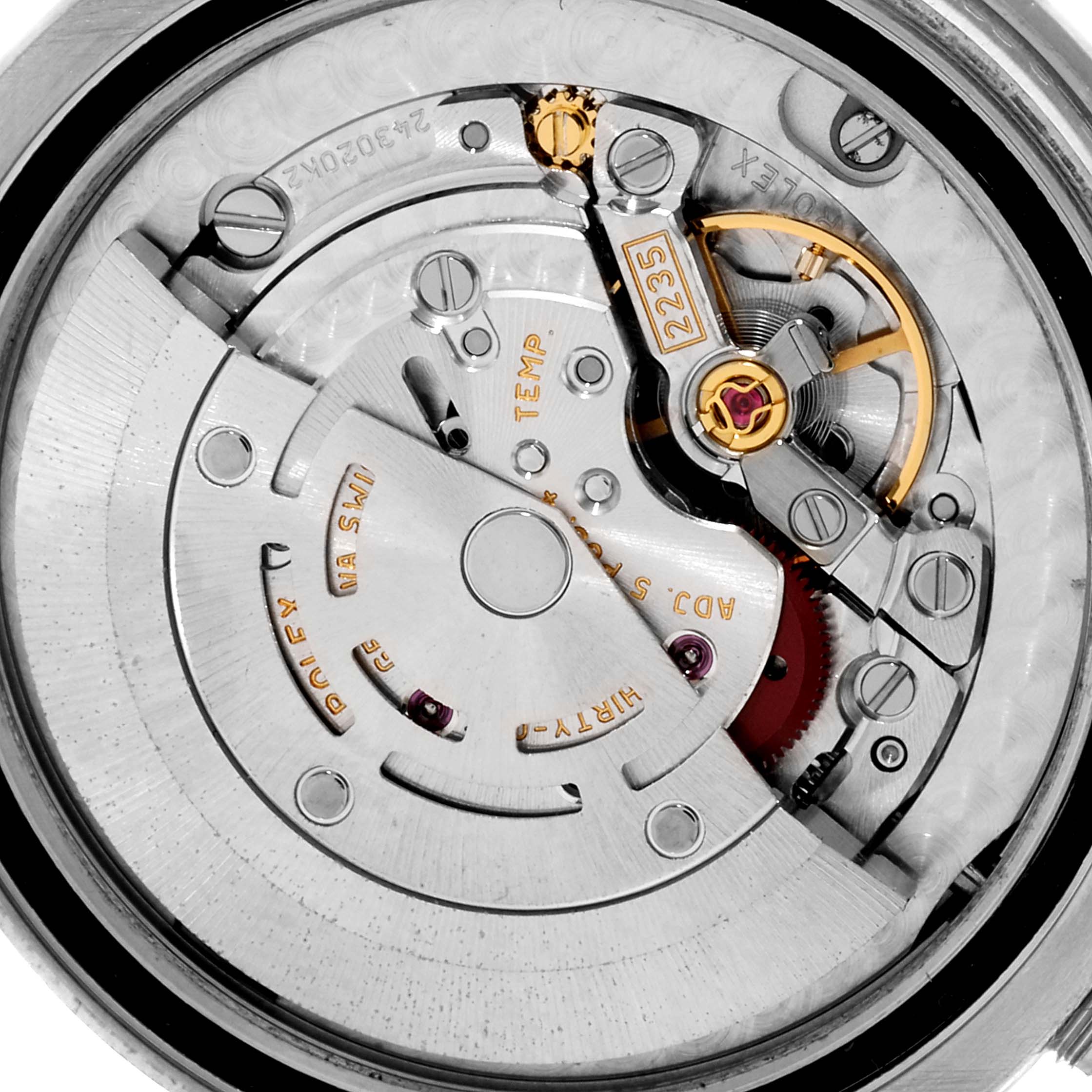 This image shows a close-up view of the intricate movement mechanism inside a Rolex Mid-Size 178384 Women
s Stainless Steel Silver Dial 178384 Women
s Stainless Steel Silver Dial watch.