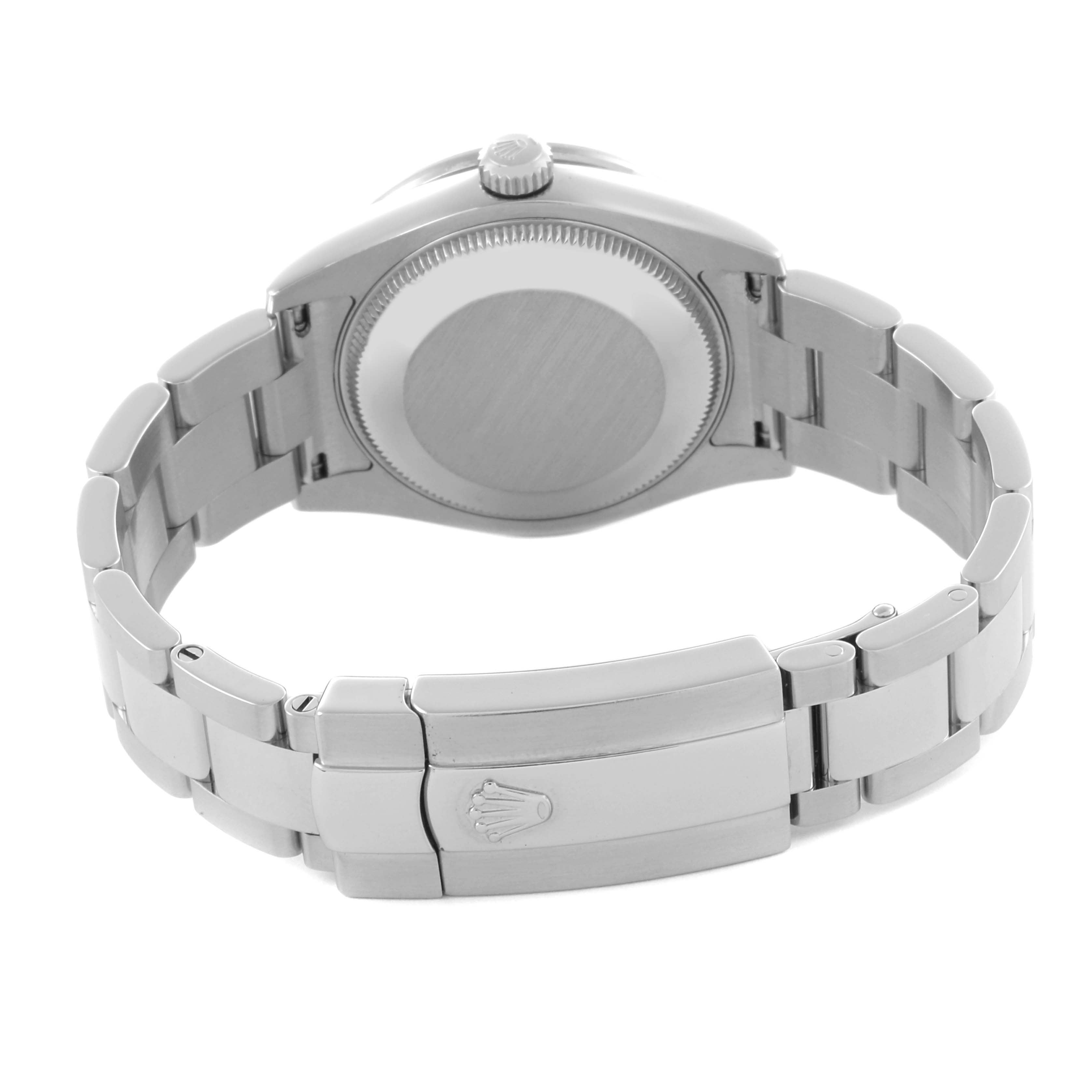 The image shows the back of a Rolex Datejust watch, including the case back, bracelet, and clasp.