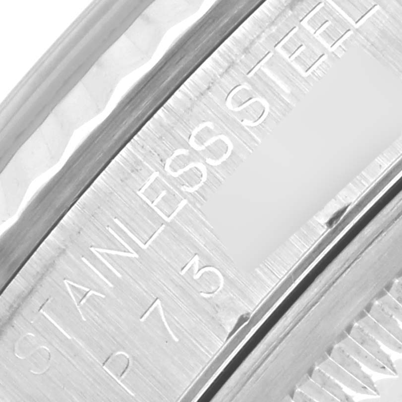 The image shows a close-up of the stainless steel part and engraving on a Rolex Datejust 16234 Men's Stainless Steel Mother of Pearl Dial 16234 Men's Stainless Steel Mother of Pearl Dial watch.