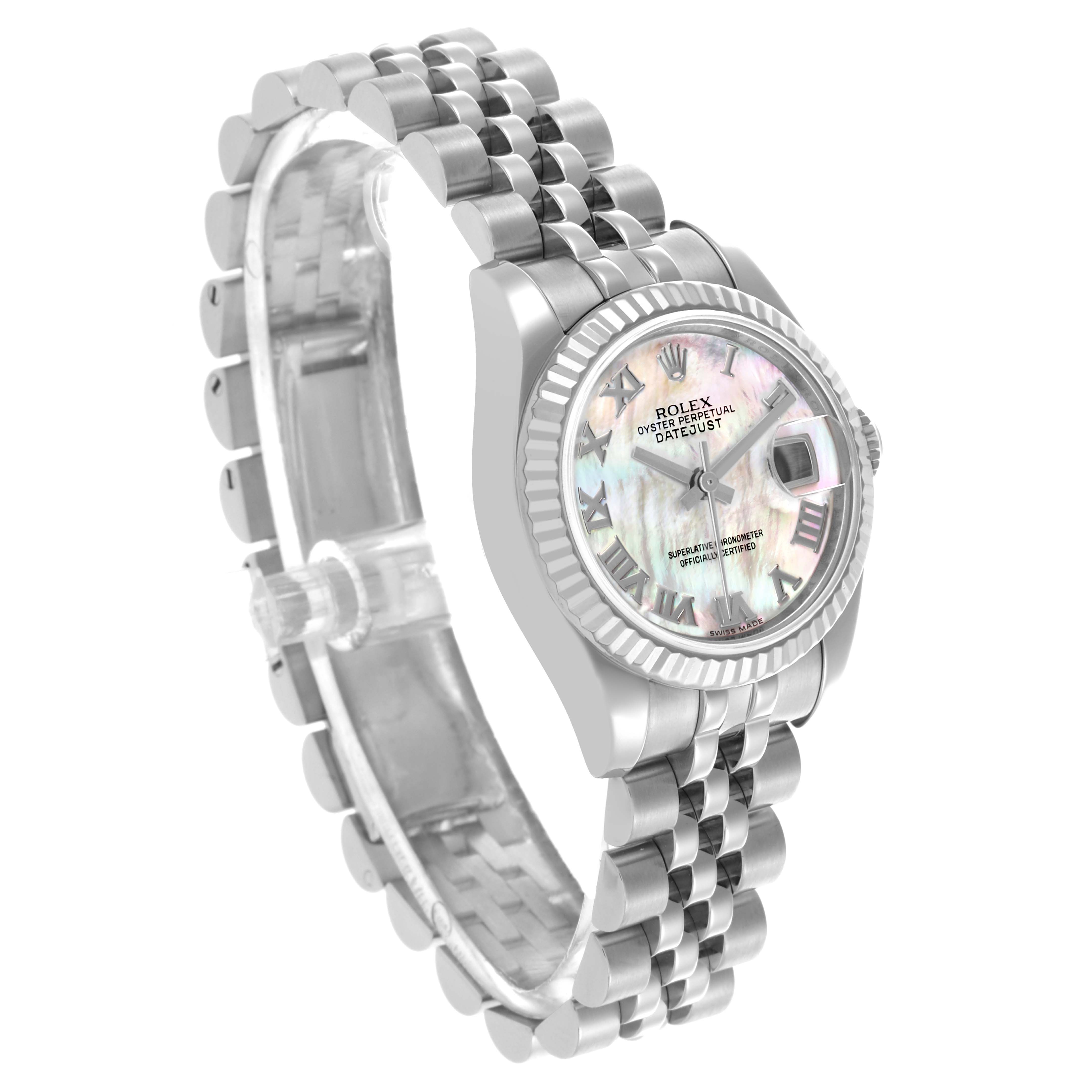 The Rolex Datejust 179174 Women's Stainless Steel Mother of Pearl Dial 179174 Women's Stainless Steel Mother of Pearl Dial watch is shown from a three-quarter angle, displaying its face, fluted bezel, and jubilee bracelet.